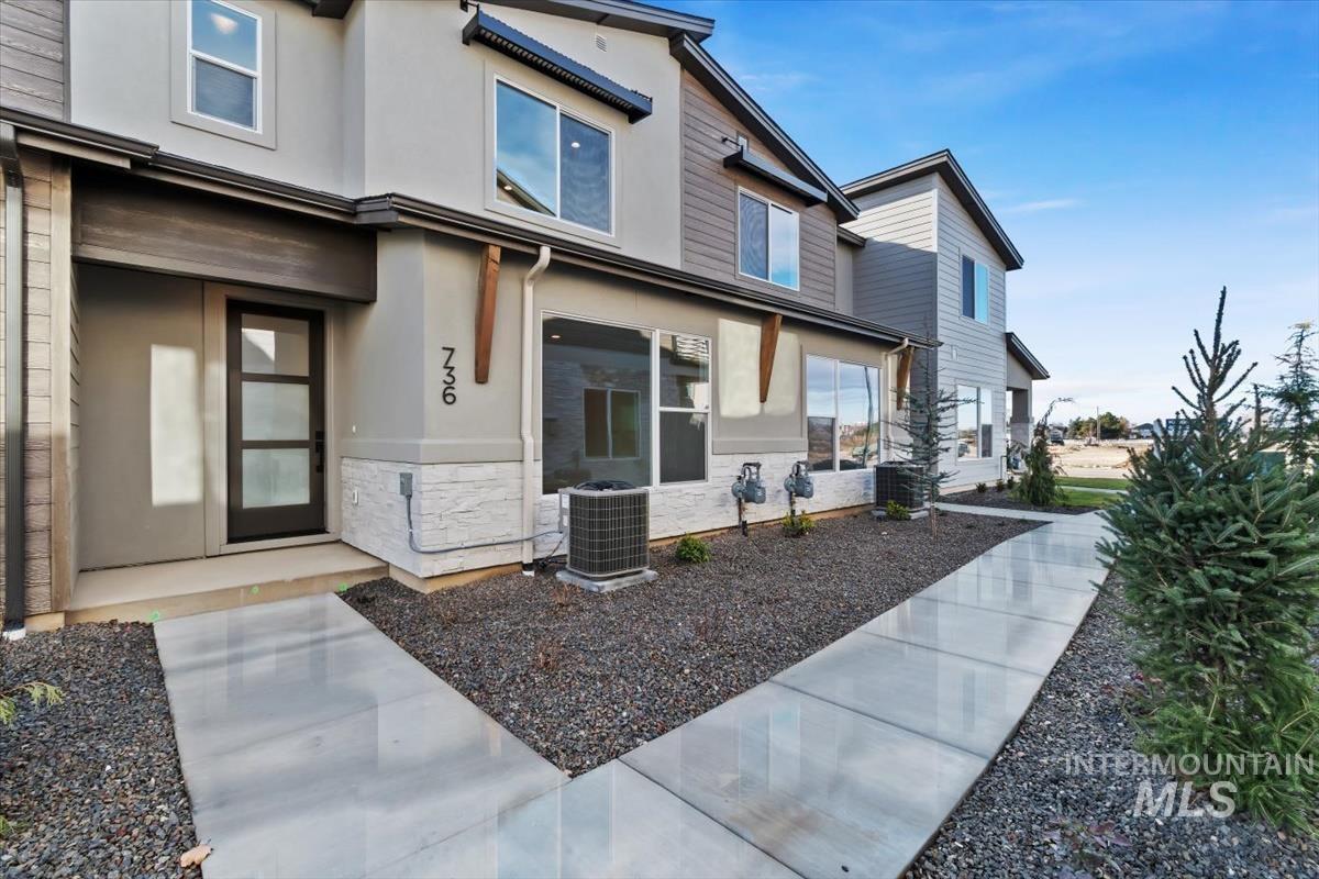 736 South Calhoun Lane Star, ID 83669 - Photo 3 of 42 Entrance to property featuring stone siding and stucco siding