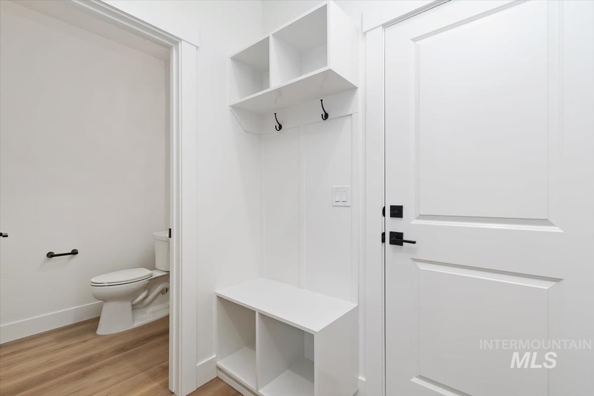 736 South Calhoun Lane Star, ID 83669 - Photo 29 of 42 Mudroom featuring light wood-style flooring and baseboards