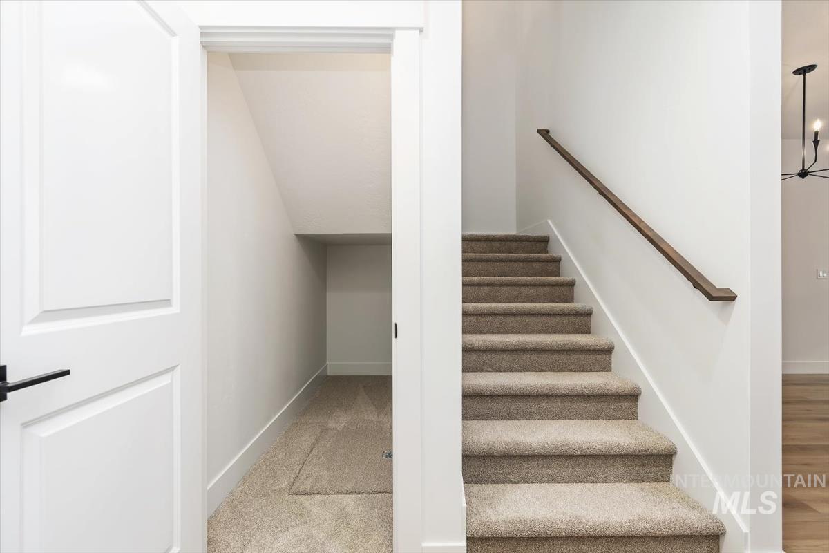 736 South Calhoun Lane Star, ID 83669 - Photo 31 of 42 Stairs featuring baseboards