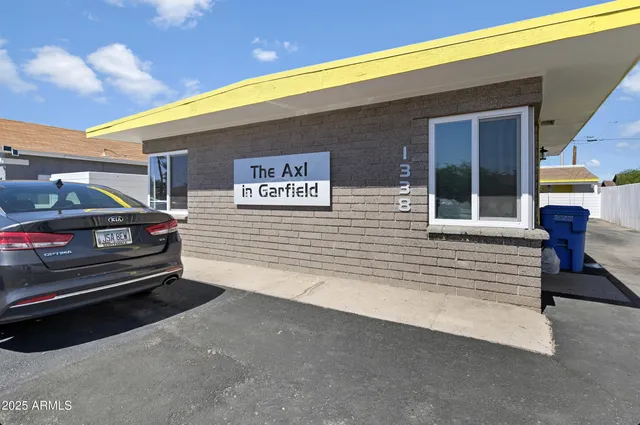 a view of a balcony with furniture