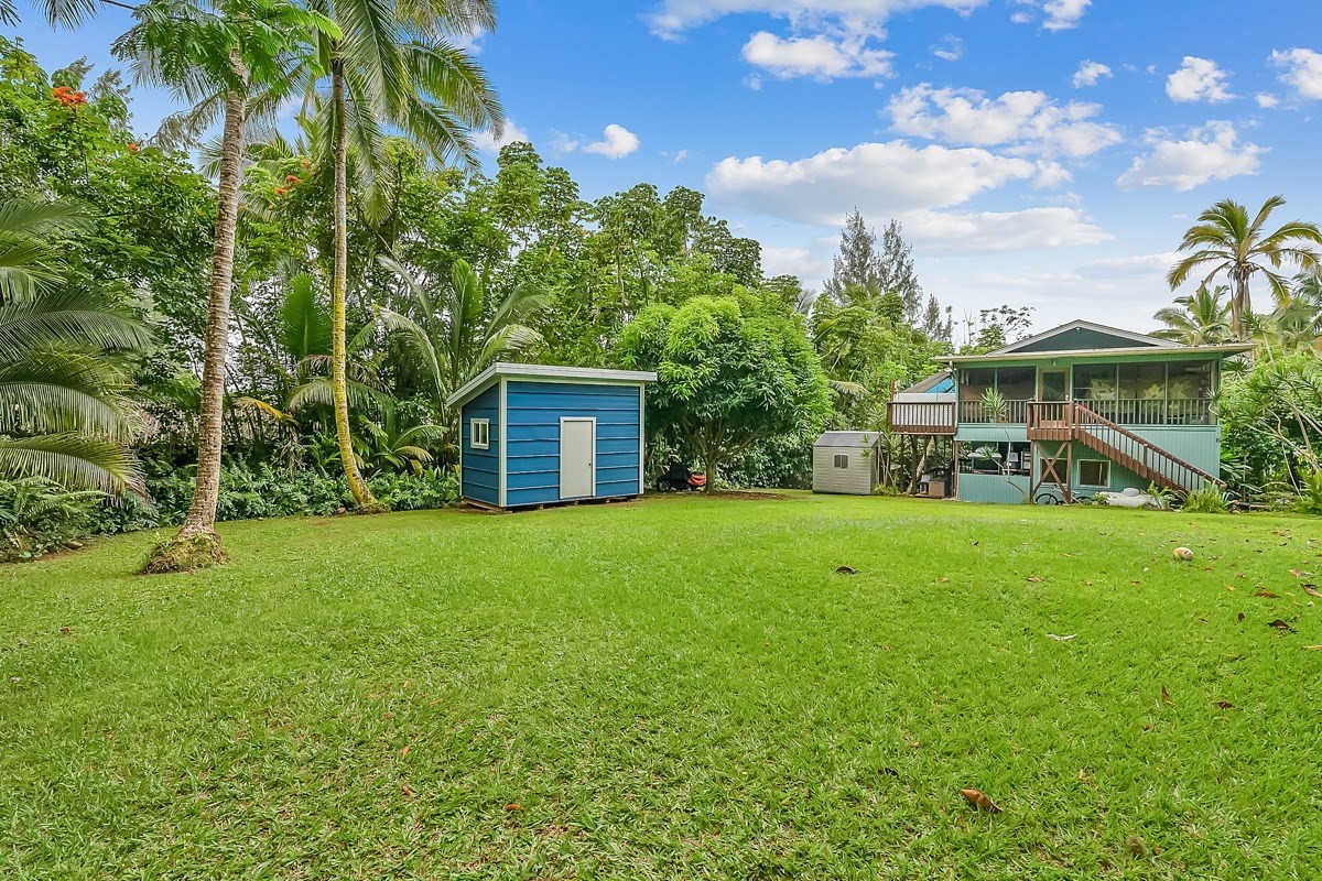 6384 Makana Road, Unit 2 Kapaa, HI 96746 - Photo 1 of 25 a view of a house with backyard