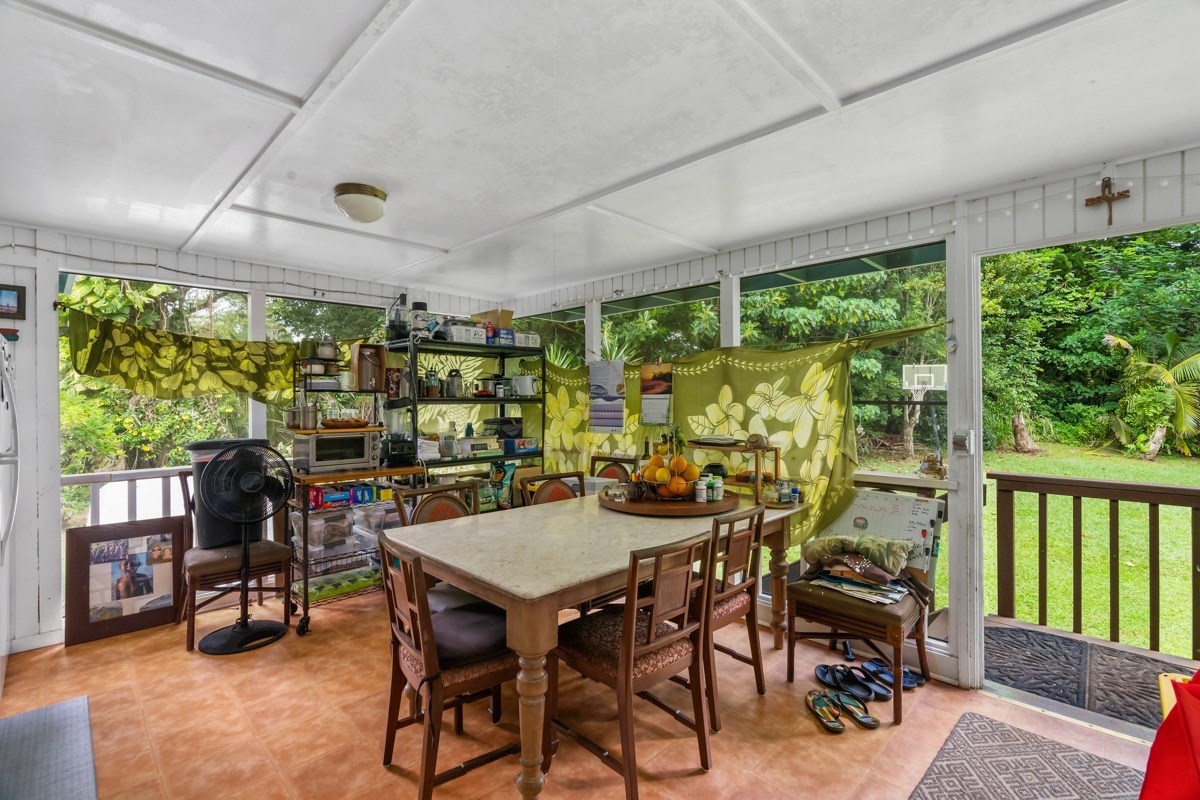 6384 Makana Road, Unit 2 Kapaa, HI 96746 - Photo 14 of 25 a view of a dining room with furniture window and outside view