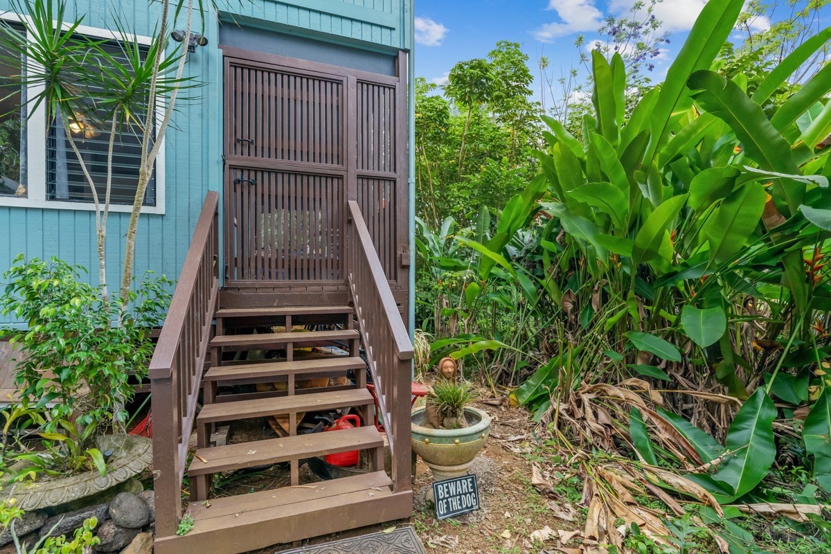 6384 Makana Road, Unit 2 Kapaa, HI 96746 - Photo 16 of 25 a front view of a house with entryway