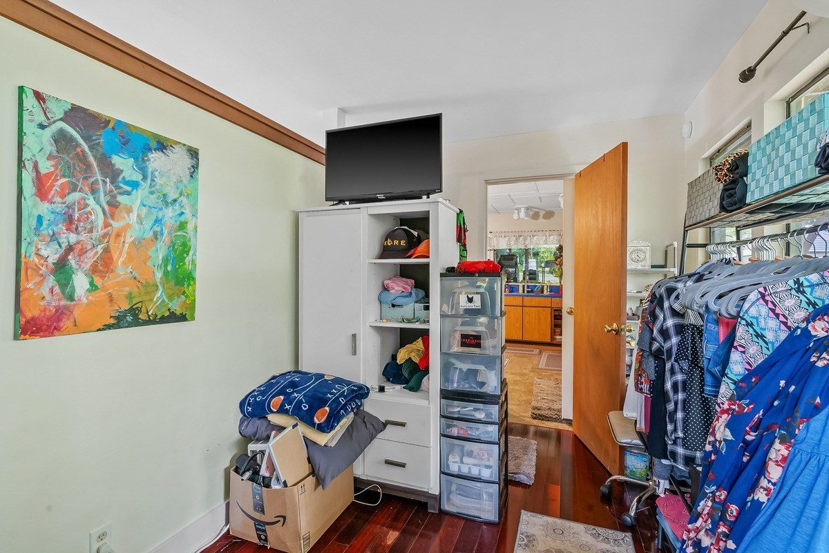 6384 Makana Road, Unit 2 Kapaa, HI 96746 - Photo 19 of 25 a bedroom with furniture and a bed