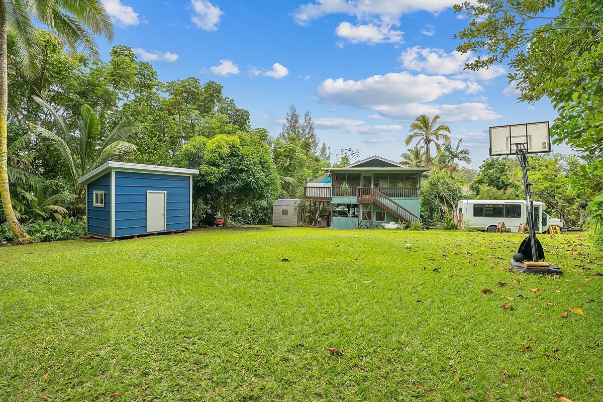 6384 Makana Road, Unit 2 Kapaa, HI 96746 - Photo 25 of 25 a view of a house with backyard