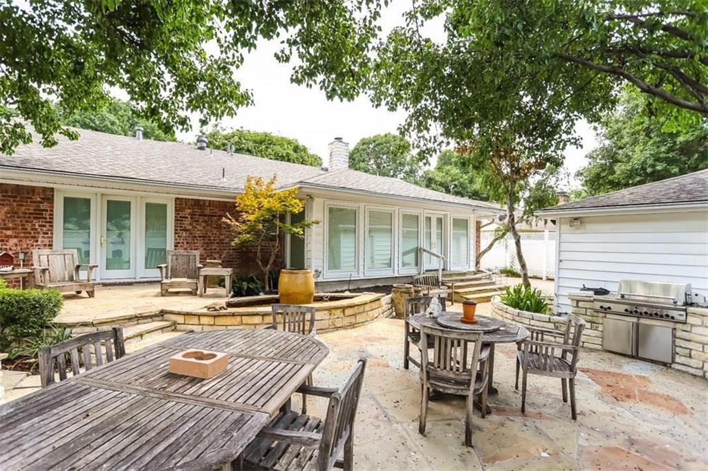 614 Twilight Trail Richardson, TX 75080 - Photo 22 of 24 a view of a house with backyard and sitting area