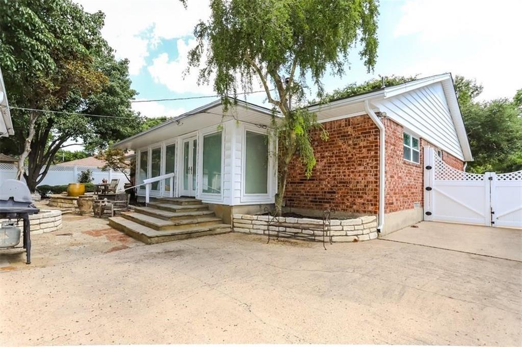 614 Twilight Trail Richardson, TX 75080 - Photo 24 of 24 a view of a house with a outdoor next to a road