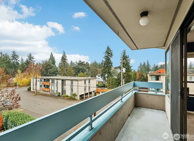 a view of a balcony with city view
