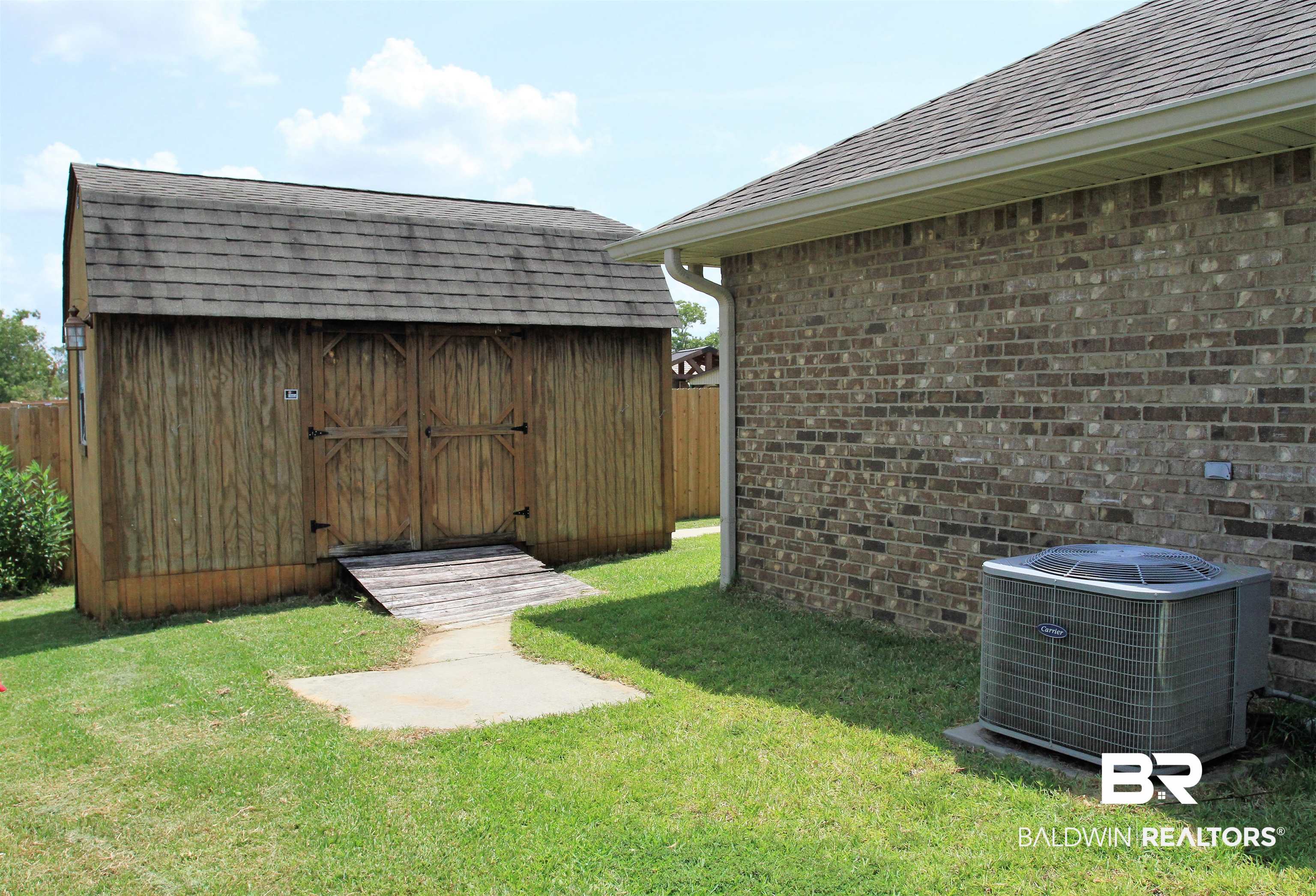 14620 Silvermere Drive Foley, AL 36535 - Photo 20 of 27 View from one entry gate. Double door to shed.