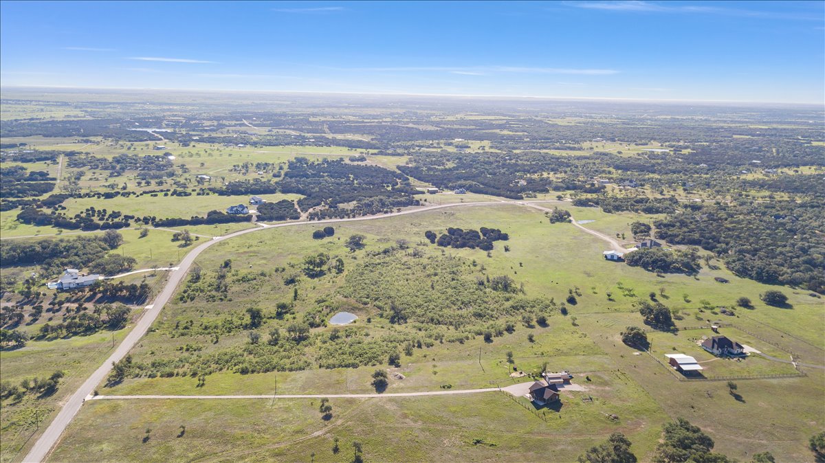 Lot 104 Carpenter Loop Burnet, TX 78611 - Photo 9 of 28 Aerial view of property and surrounding area featuring rural landscape