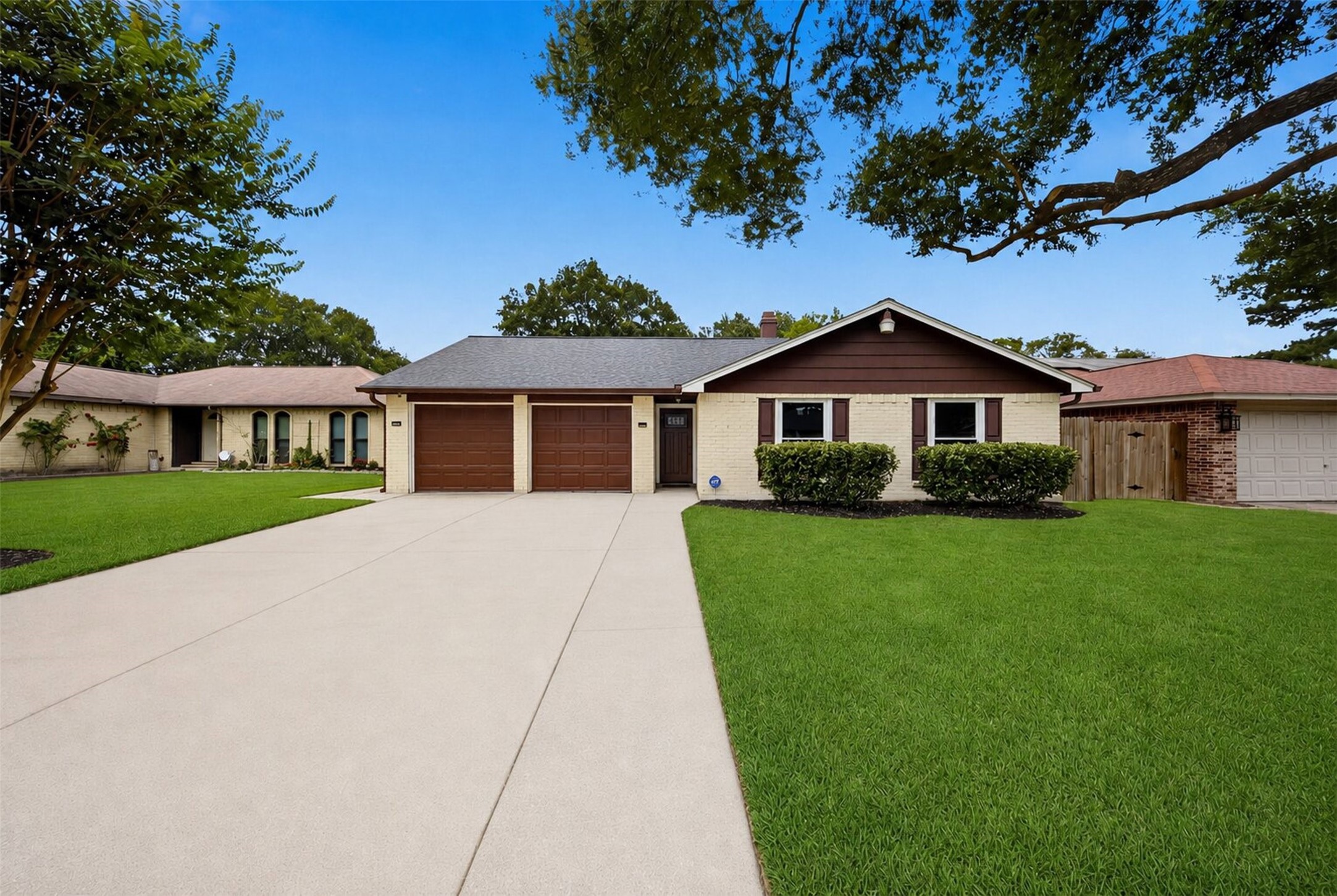 9418 Kilrenny Drive Spring, TX 77379 - Photo 42 of 47 a front view of a house with a garden
