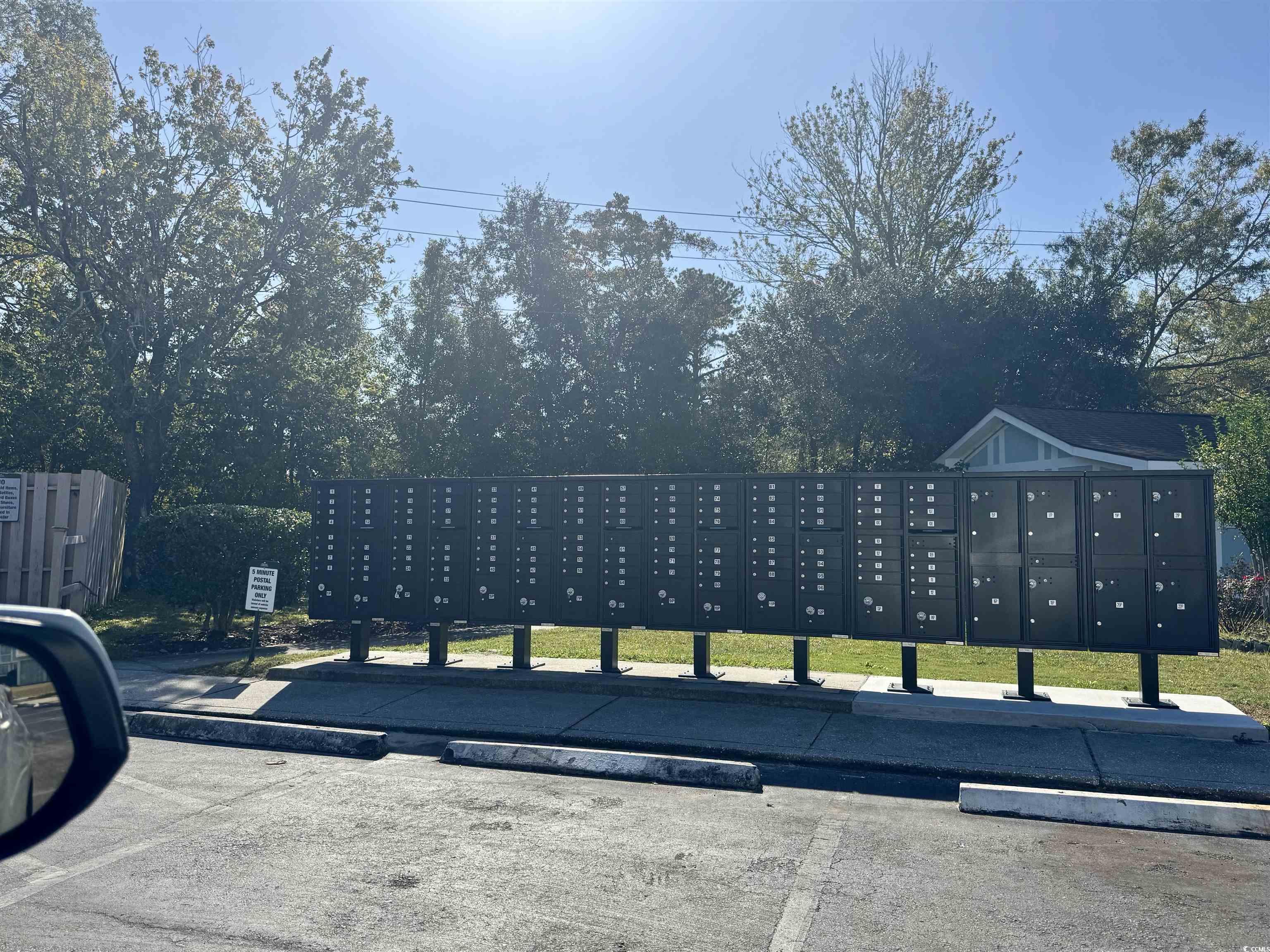 1207 Pinegrove Drive, Unit D Myrtle Beach, SC 29577 - Photo 16 of 16 Community pool with a patio