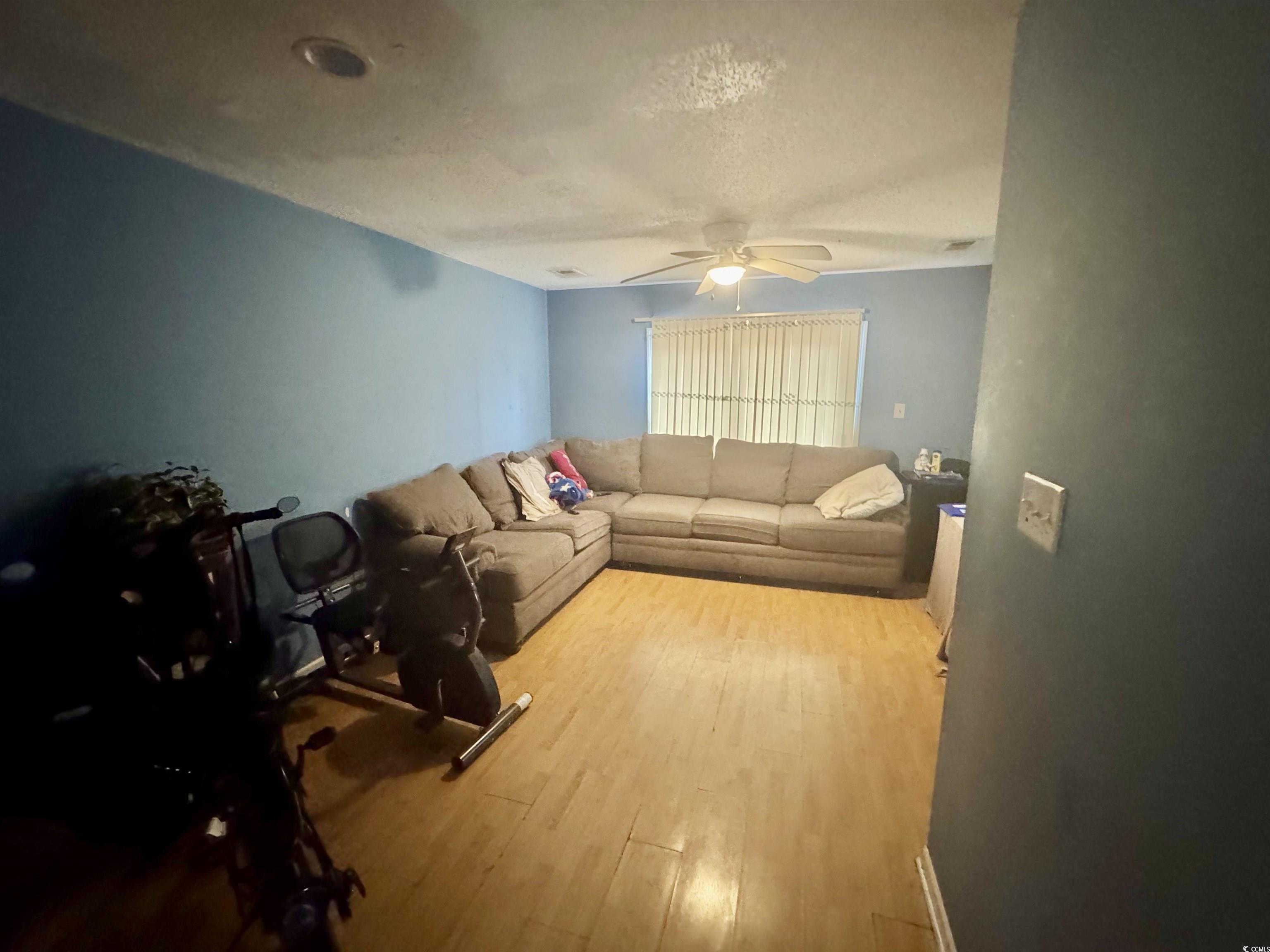 1207 Pinegrove Drive, Unit D Myrtle Beach, SC 29577 - Photo 5 of 16 Corridor featuring light tile patterned floors and baseboards