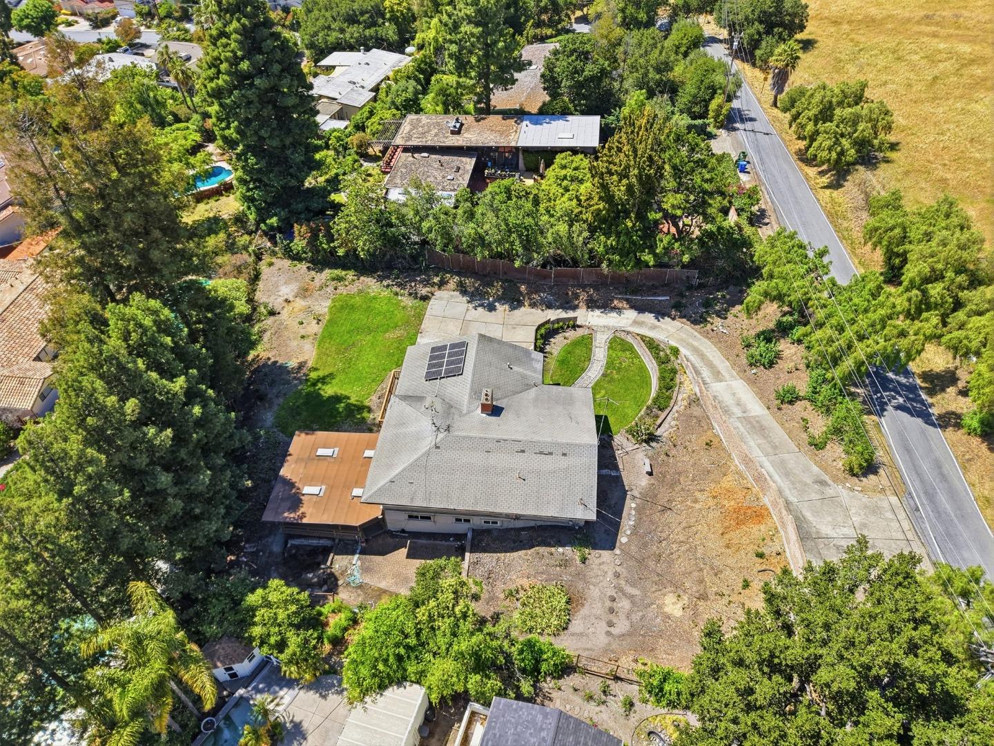 208 Mill Creek Road Fremont, CA 94539 - Photo 47 of 59 an aerial view of a house with a swimming pool