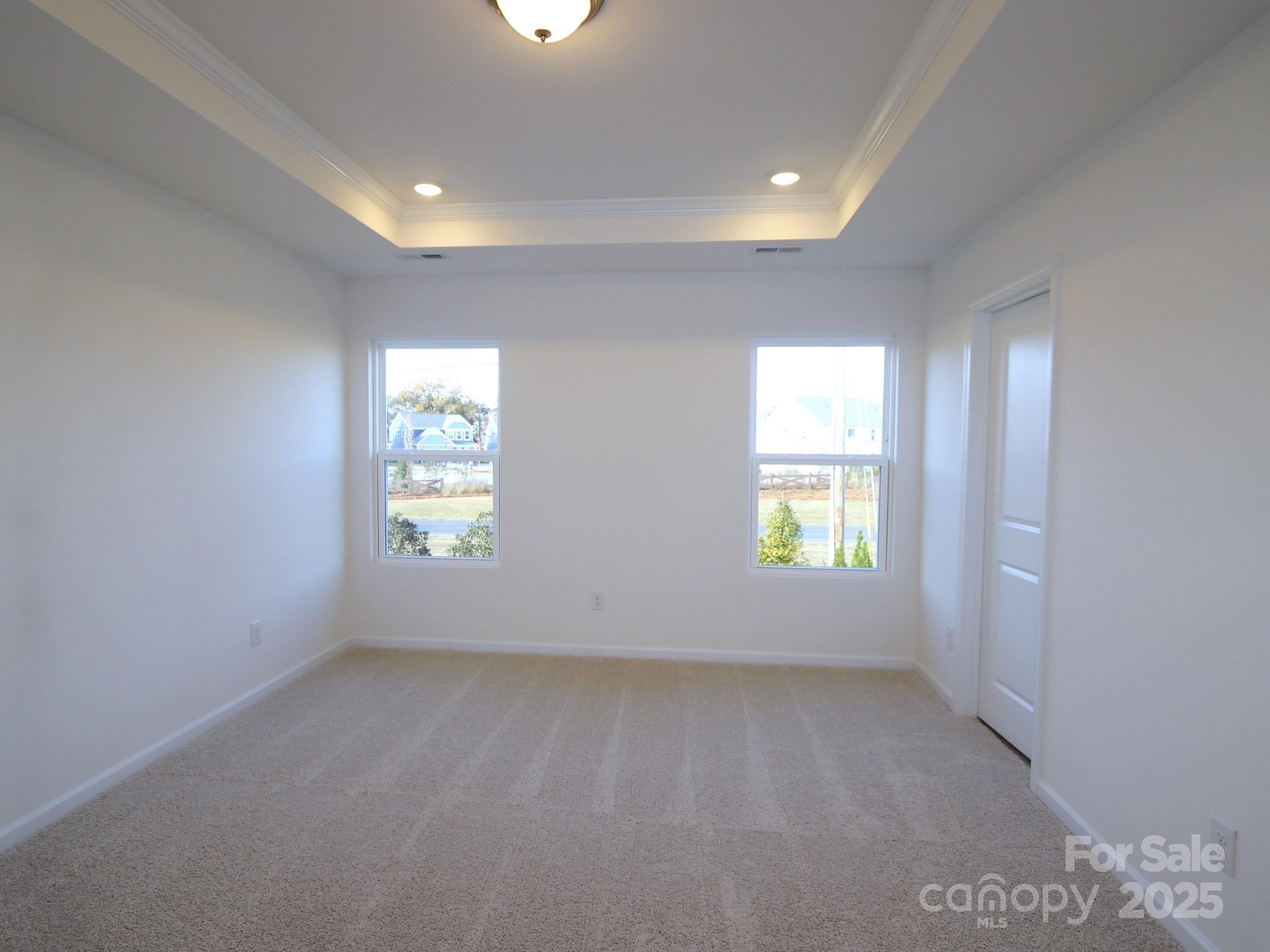 1014 Overbrook Place Wingate, NC 28174 - Photo 16 of 21 an empty room with windows