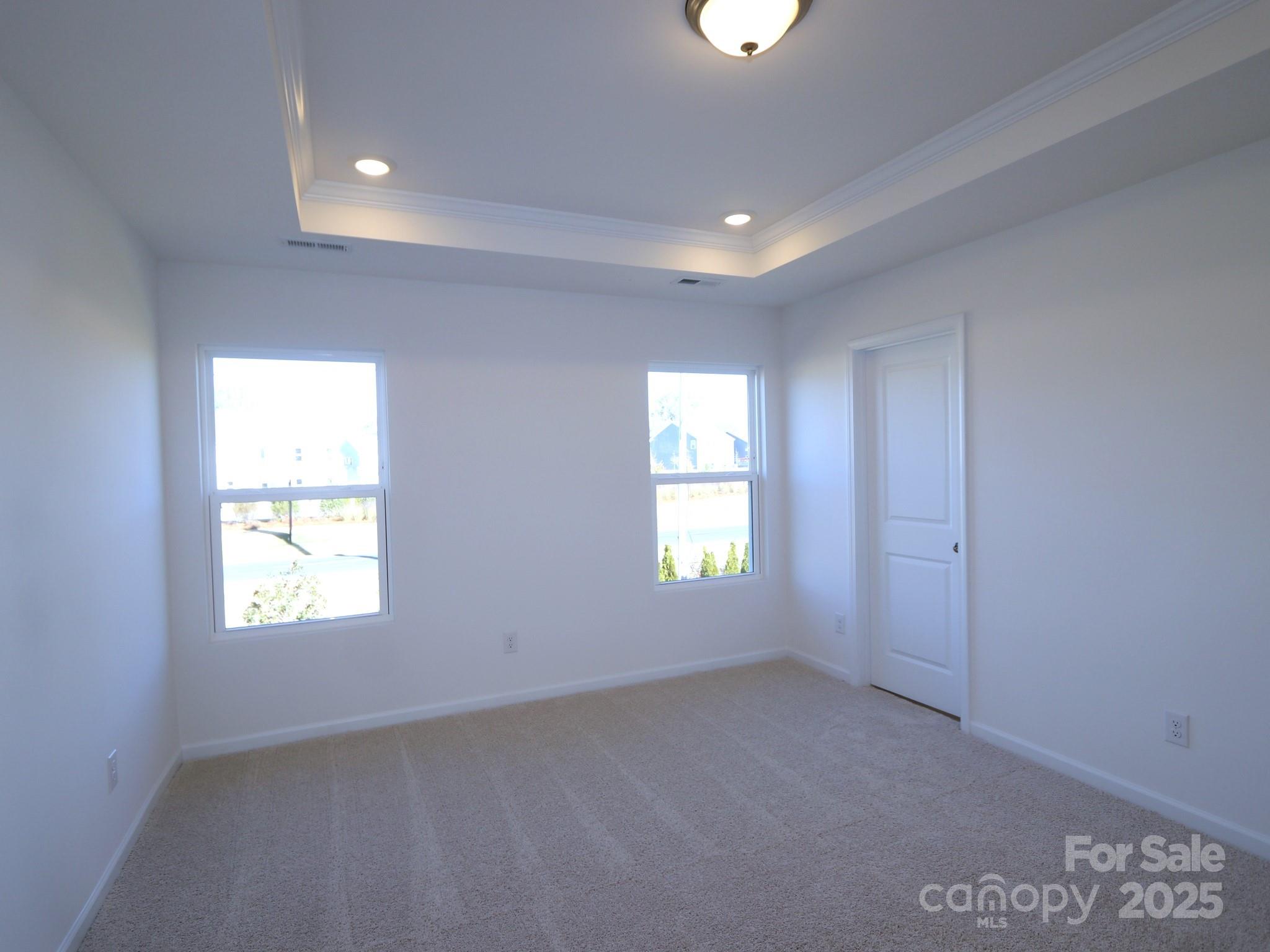 1014 Overbrook Place Wingate, NC 28174 - Photo 17 of 21 an empty room with windows