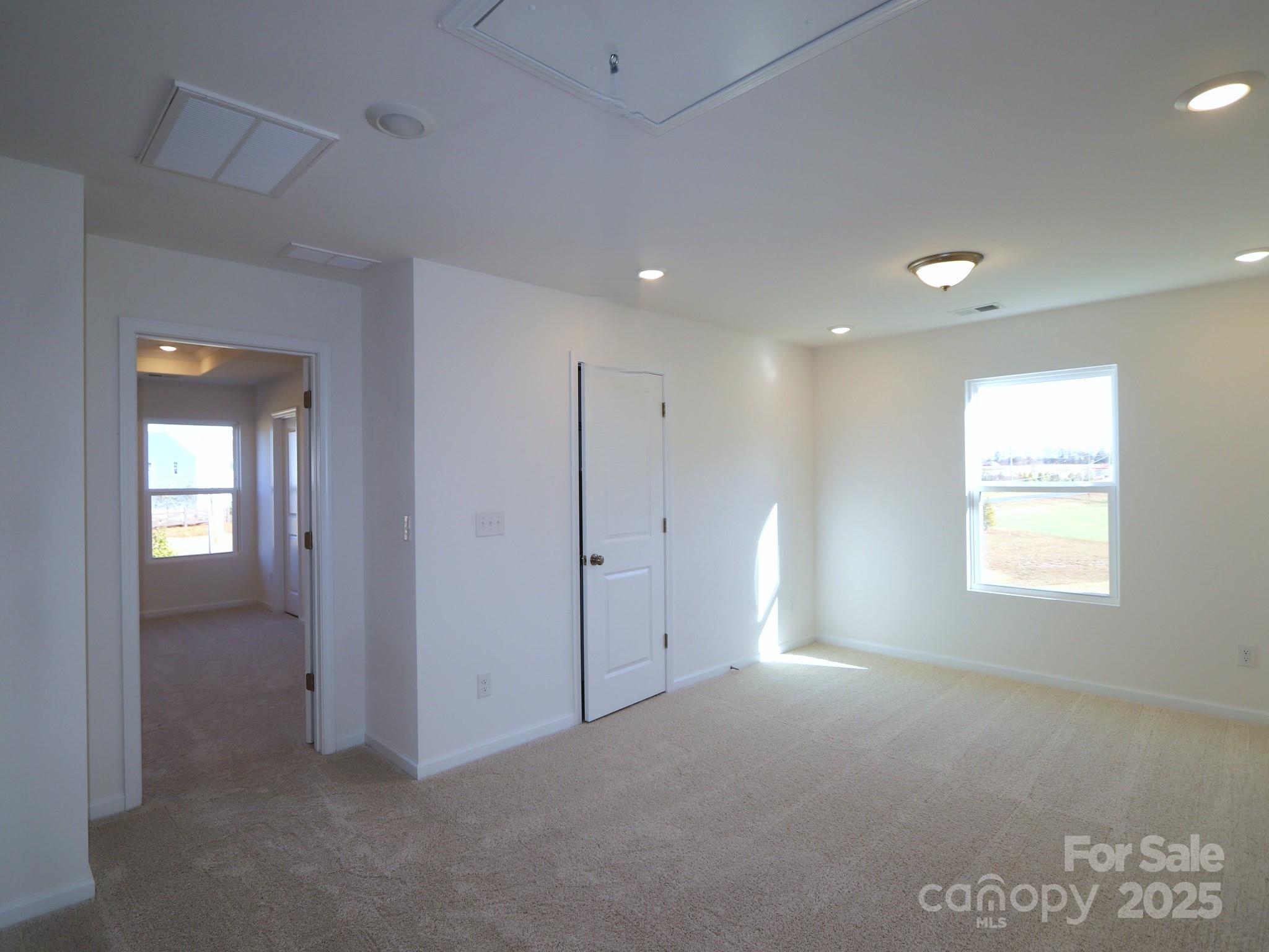 1014 Overbrook Place Wingate, NC 28174 - Photo 10 of 21 a view of an empty room with a window