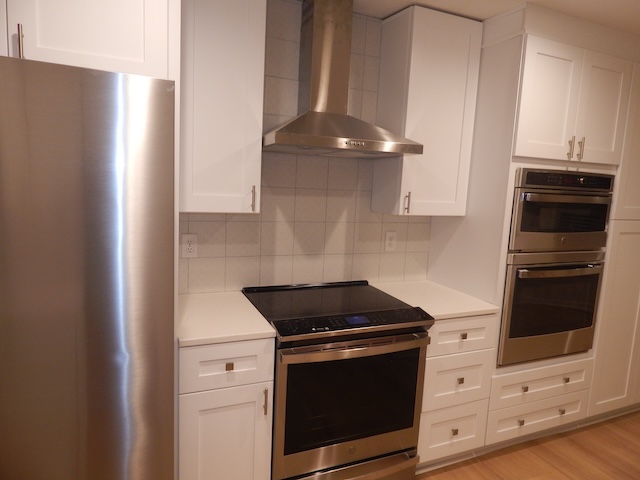 620 Downs Loop Clemson, SC 29631 - Photo 20 of 35 Sleek stainless steel appliances integrate seamlessly with clean white cabinetry and smooth stone countertops.