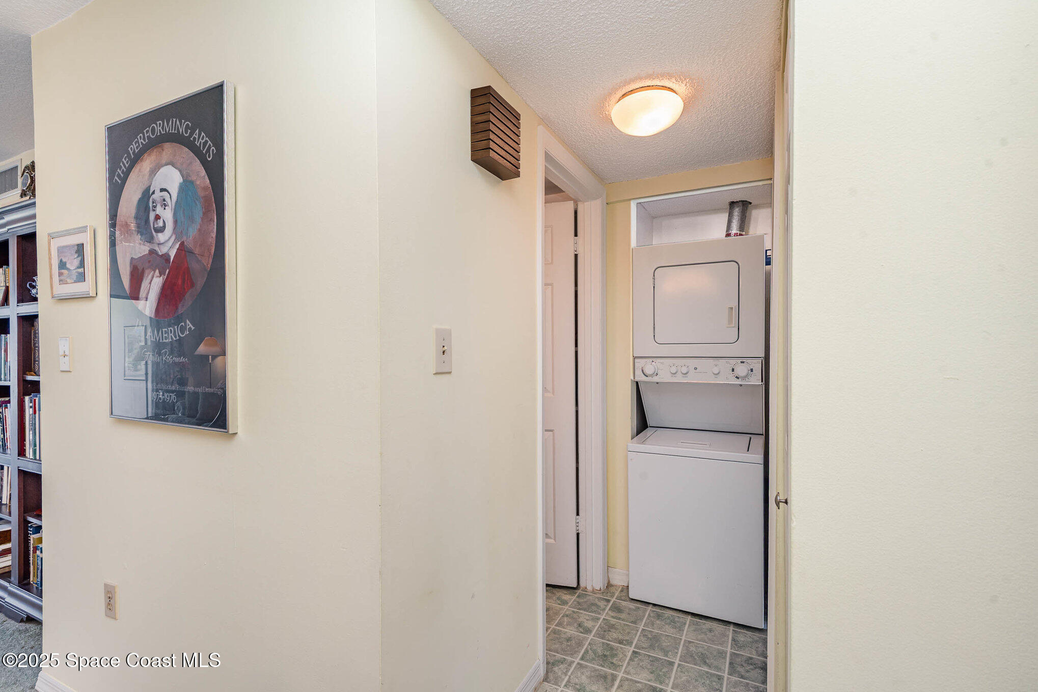 1999 South Banana River Boulevard, Unit 313 Cocoa Beach, FL 32931 - Photo 20 of 24 a bathroom with a granite countertop mirror and a shower