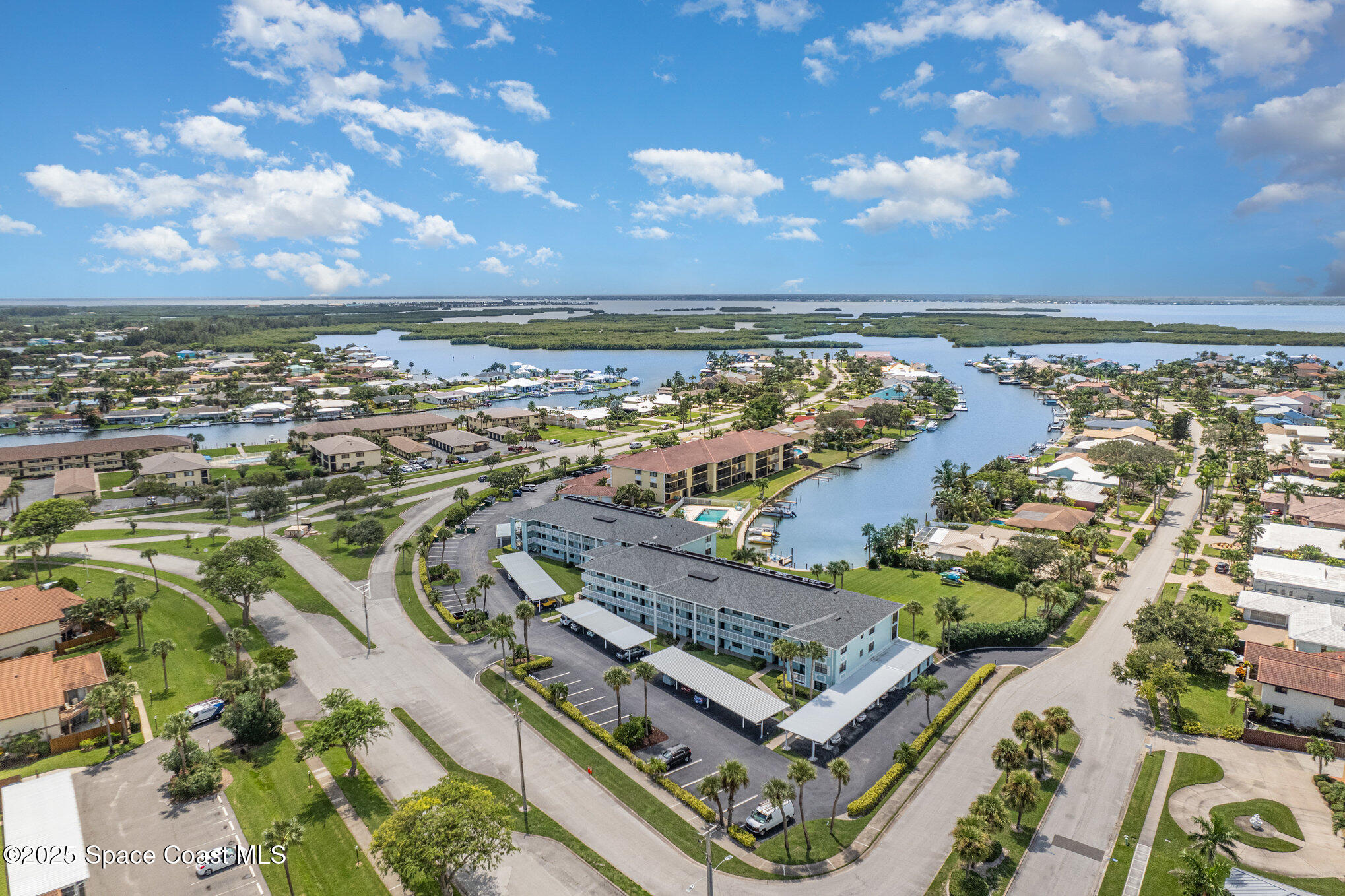1999 South Banana River Boulevard, Unit 313 Cocoa Beach, FL 32931 - Photo 21 of 24 an aerial view of a city