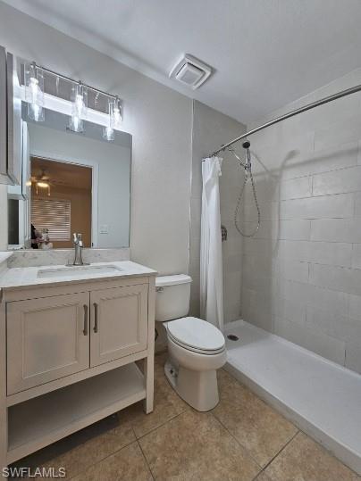 9209 Seville Road Fort Myers, FL 33967 - Photo 10 of 13 a bathroom with a sink toilet a mirror and shower