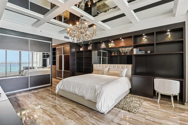 a bed room with a bed and cabinet