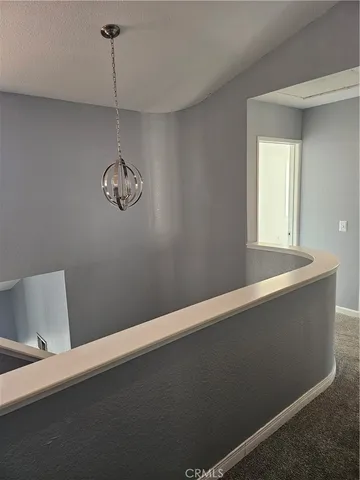 a view of a room that has a window in it