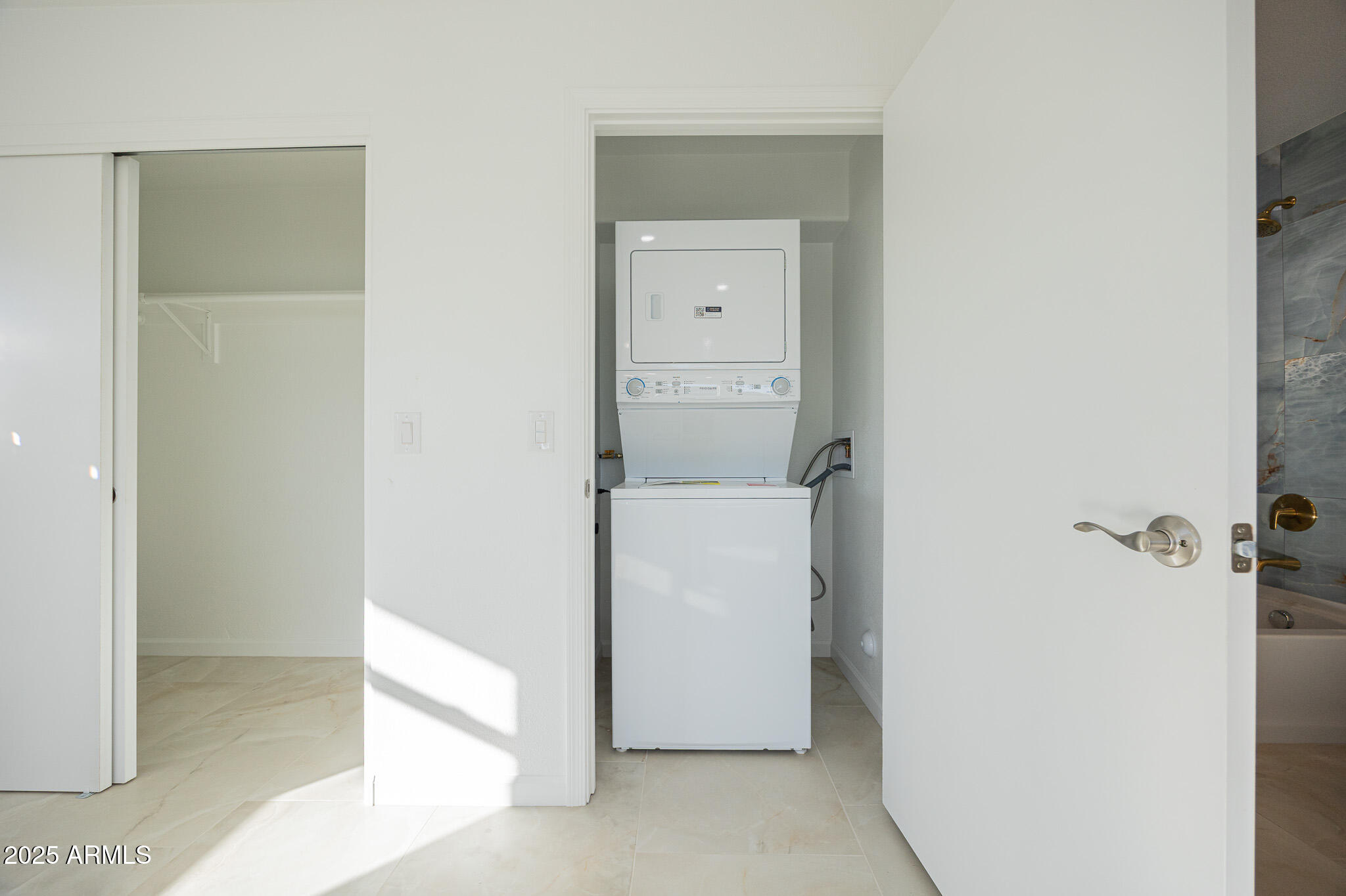 5132 South Dorsey Lane, Unit A Tempe, AZ 85282 - Photo 14 of 15 a utility room with cabinets washer and dryer