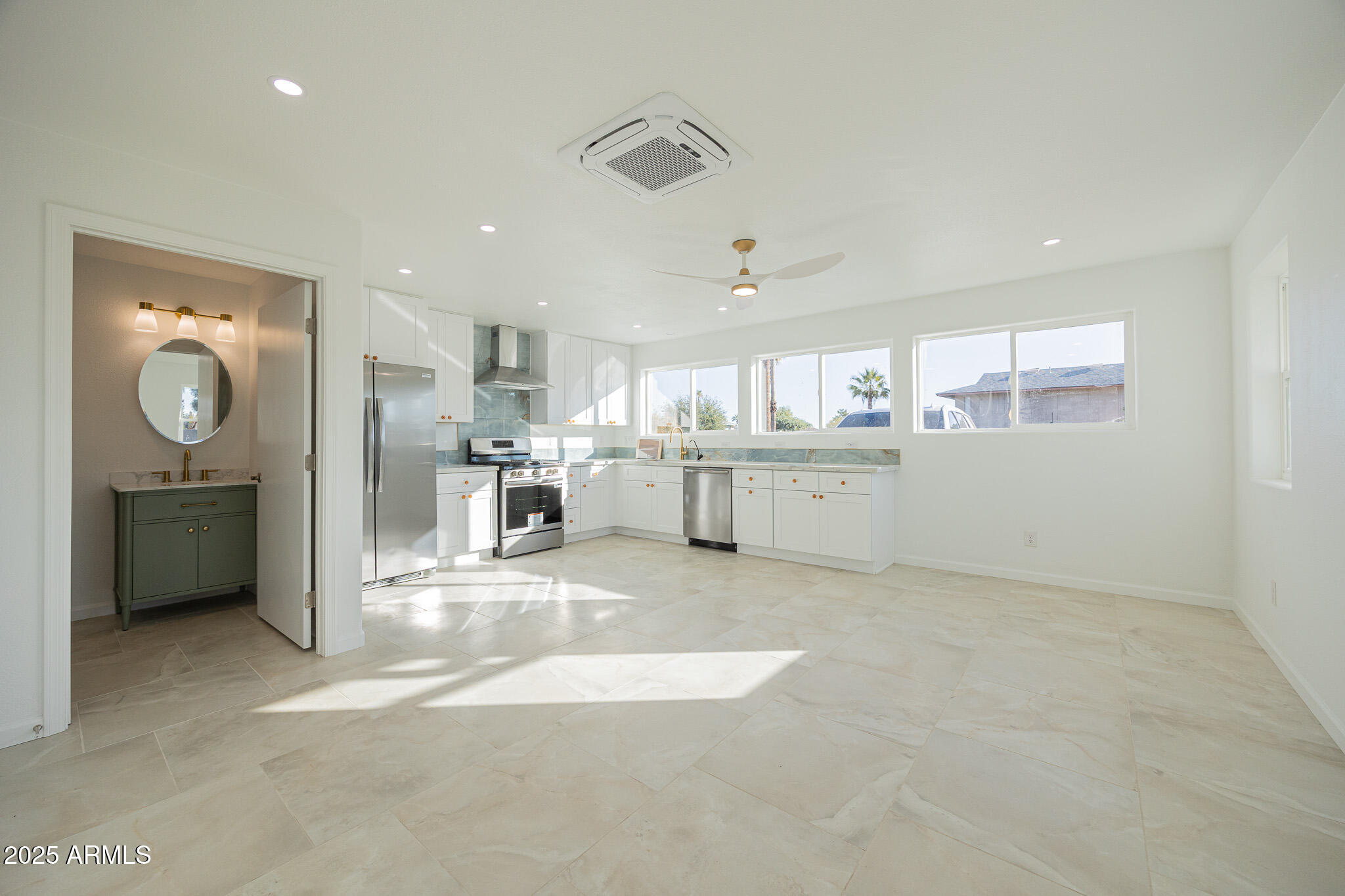 5132 South Dorsey Lane, Unit A Tempe, AZ 85282 - Photo 3 of 15 a view of a kitchen with a sink and cabinets