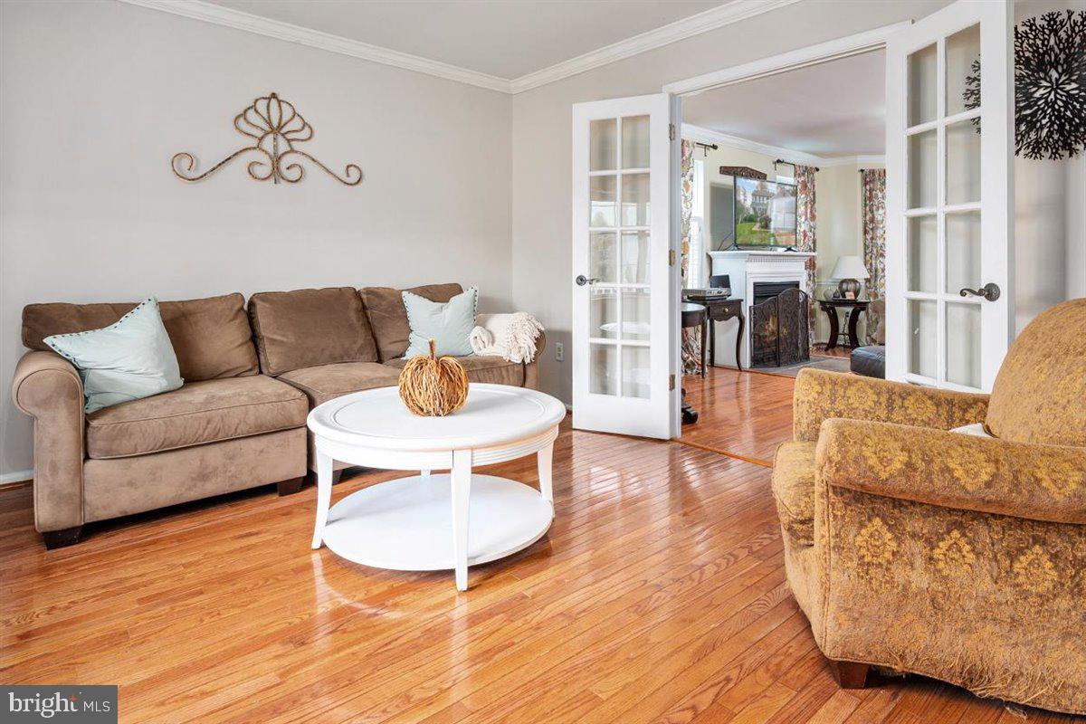 845 Sunny Chapel Road Odenton, MD 21113 - Photo 6 of 45 Living room with french doors to family room