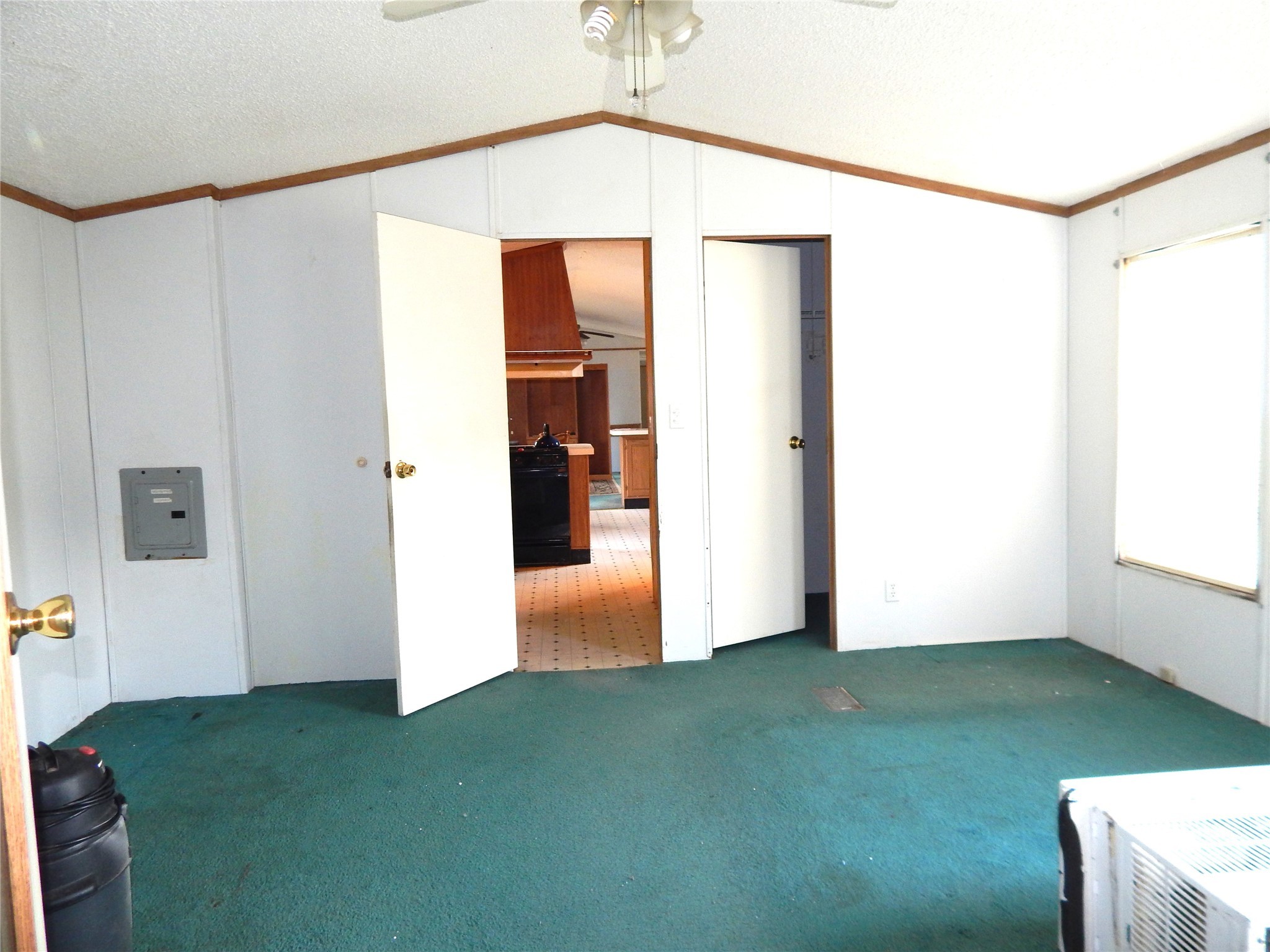 9343 Greens Road Humble, TX 77396 - Photo 13 of 16 a view of an empty room with closet and a window