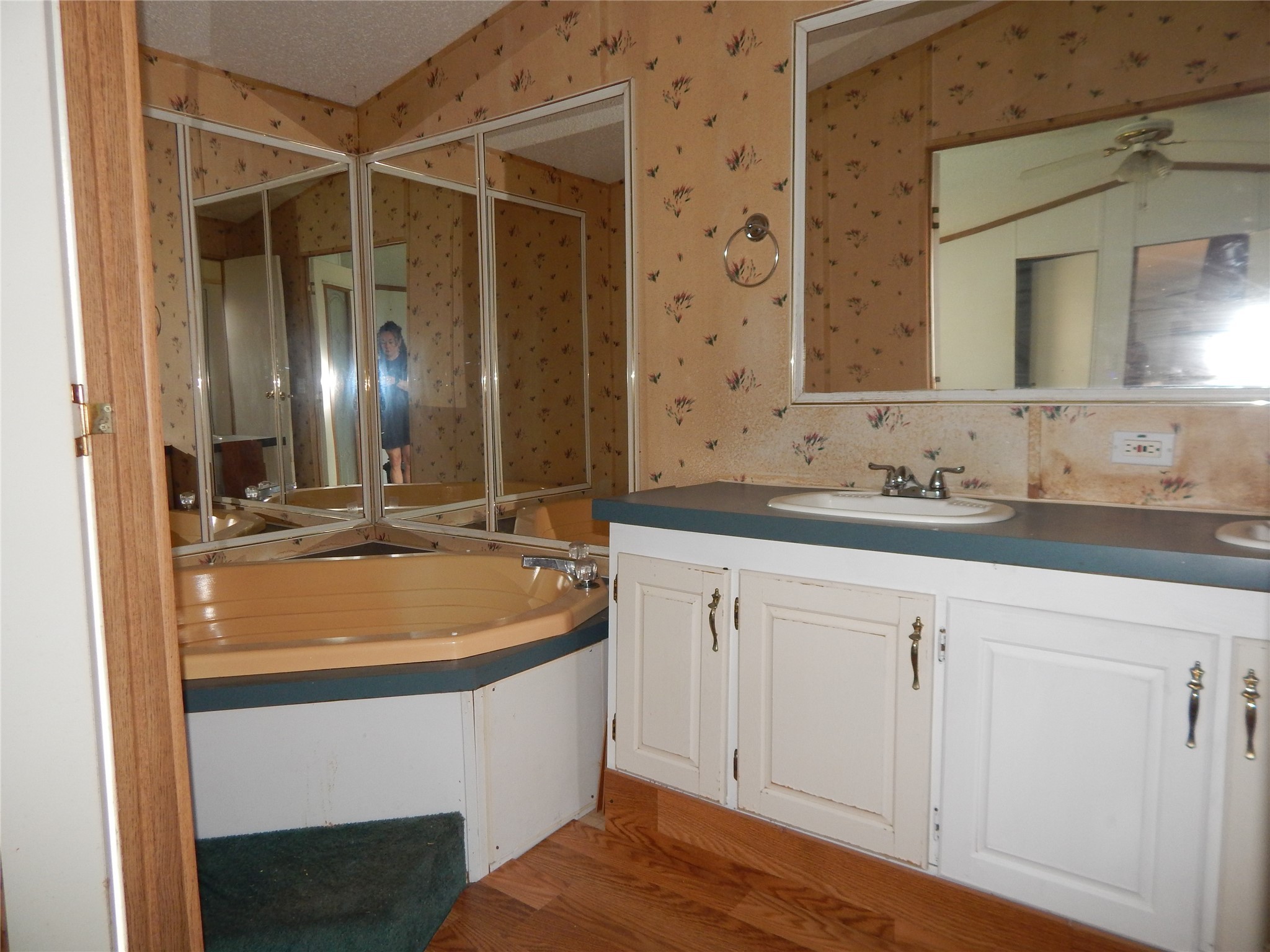 9343 Greens Road Humble, TX 77396 - Photo 15 of 16 a bathroom with a sink double vanity and a mirror