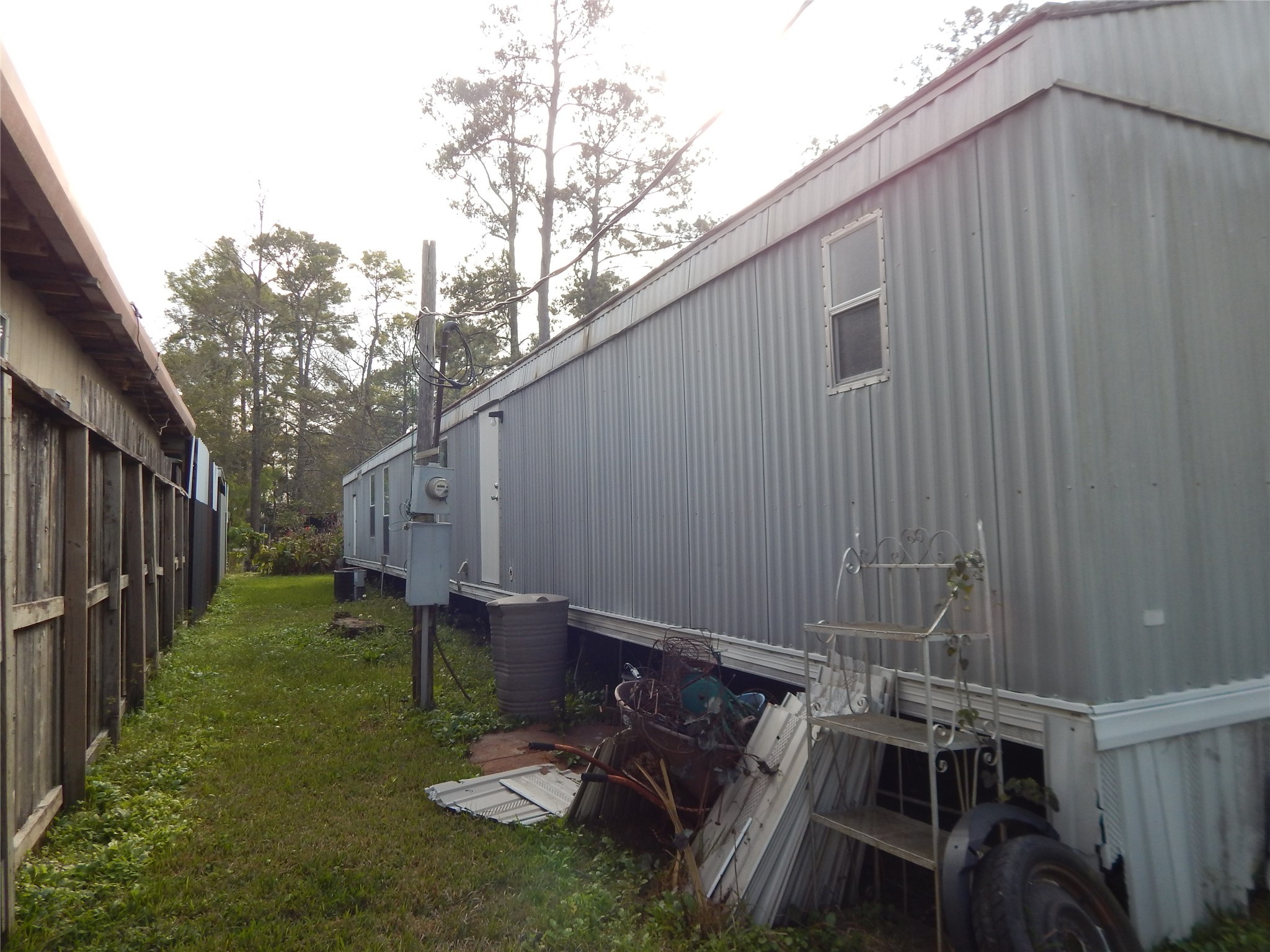 9343 Greens Road Humble, TX 77396 - Photo 4 of 16 a backyard of a house with table and chairs