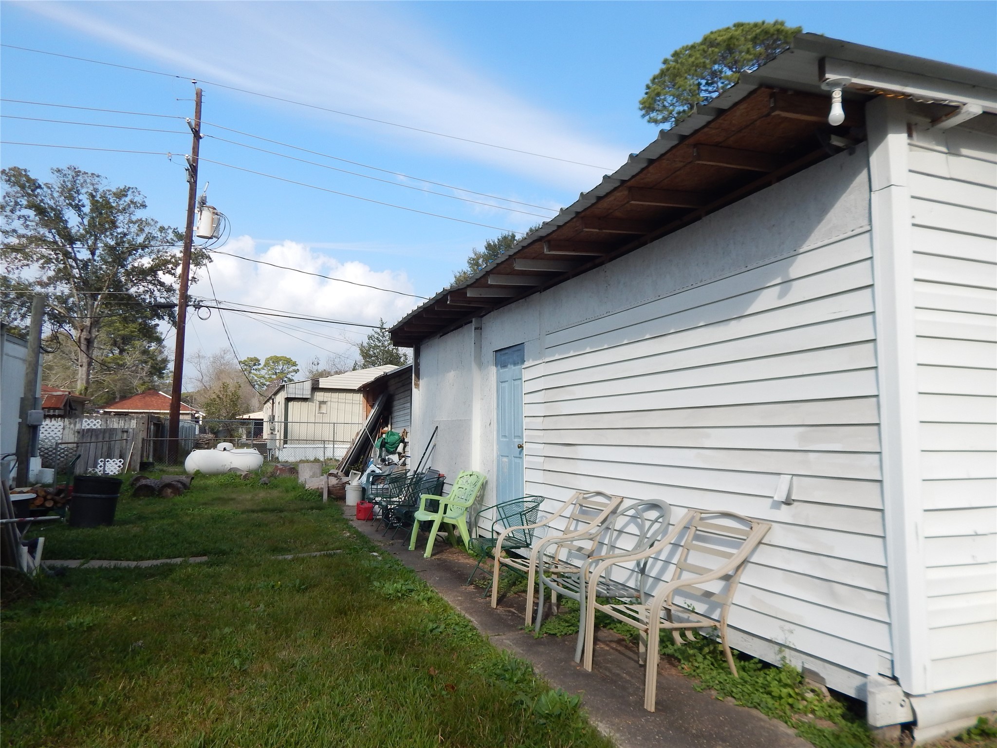 9343 Greens Road Humble, TX 77396 - Photo 5 of 16 a backyard of a house with table and chairs