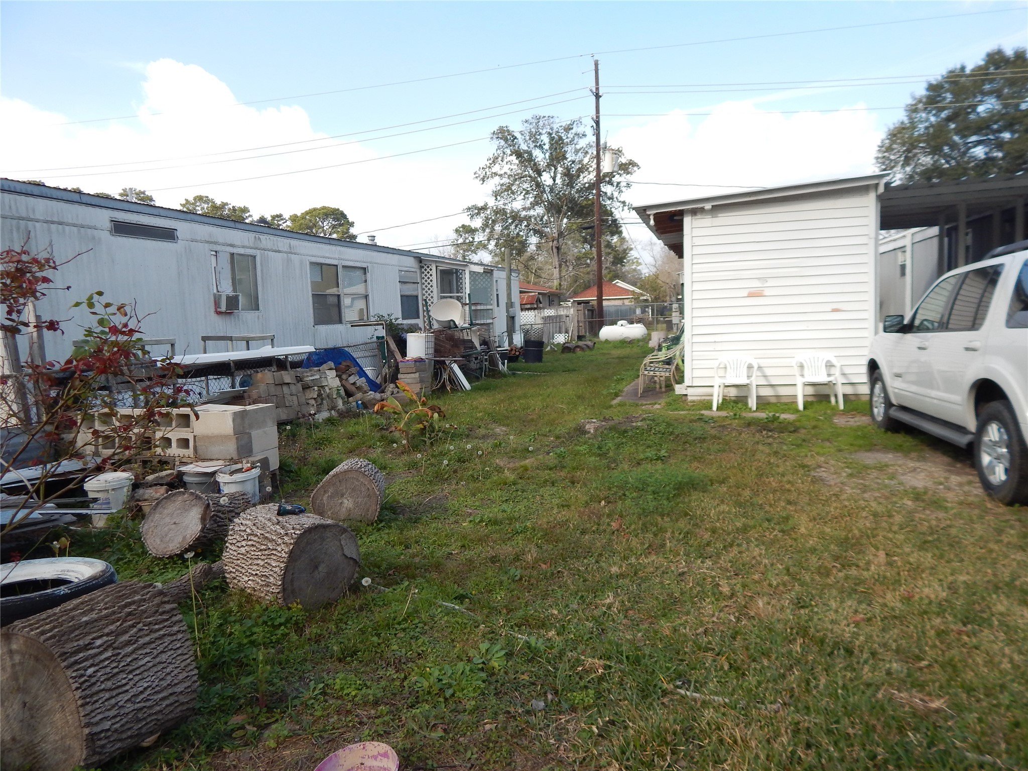 9343 Greens Road Humble, TX 77396 - Photo 6 of 16 a view of a house with a backyard