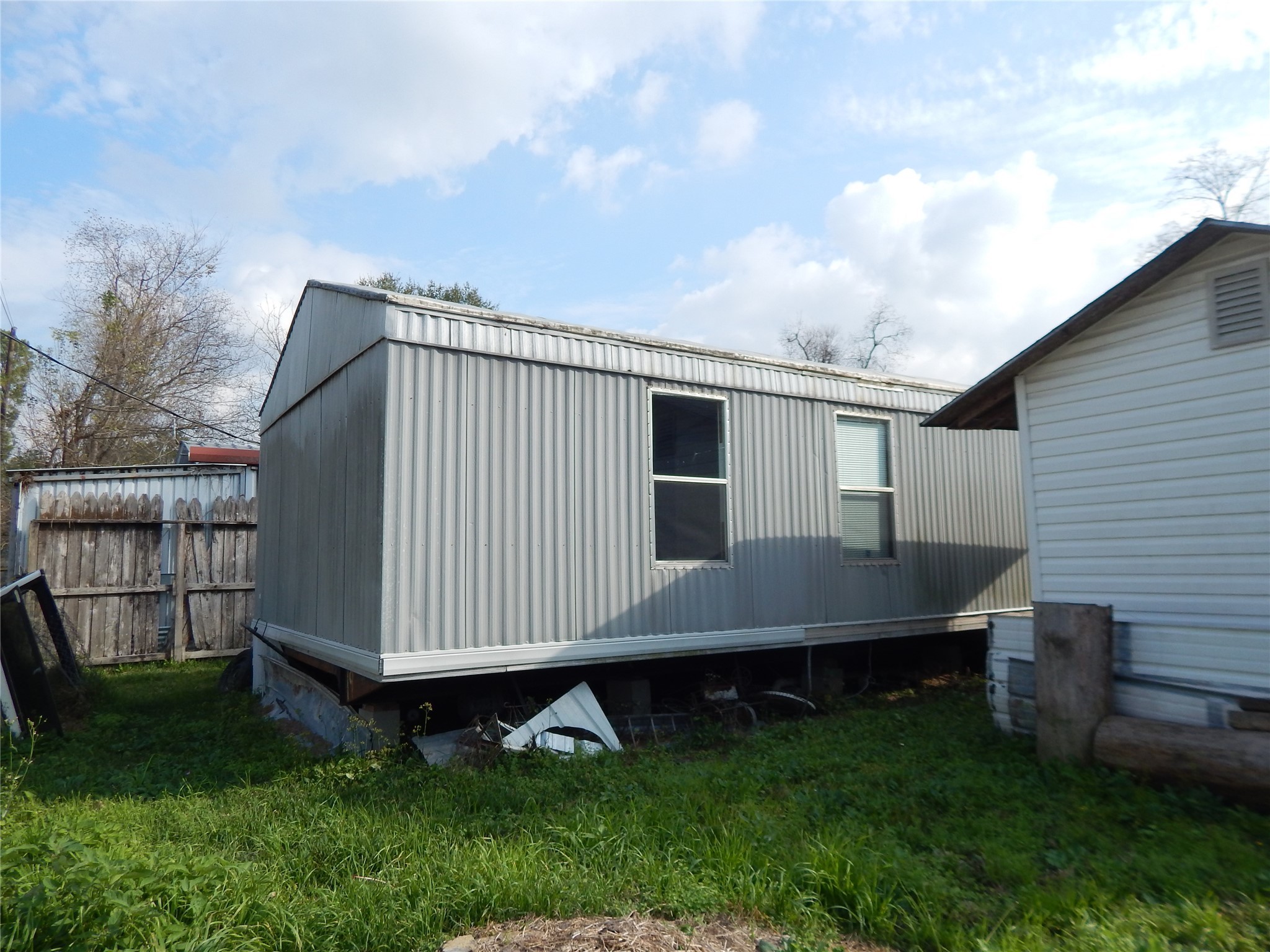 9343 Greens Road Humble, TX 77396 - Photo 7 of 16 a backyard of a house with lots of green space