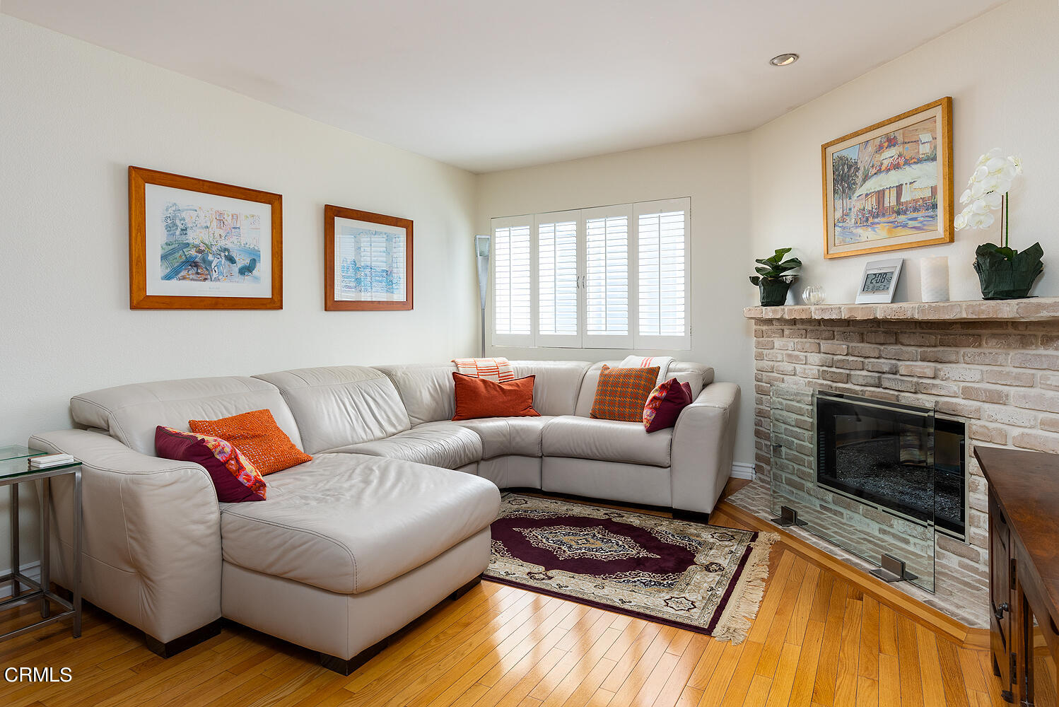 3075 Foothill Boulevard, Unit 137 La Crescenta, CA 91214 - Photo 11 of 23 a living room with furniture and a fireplace