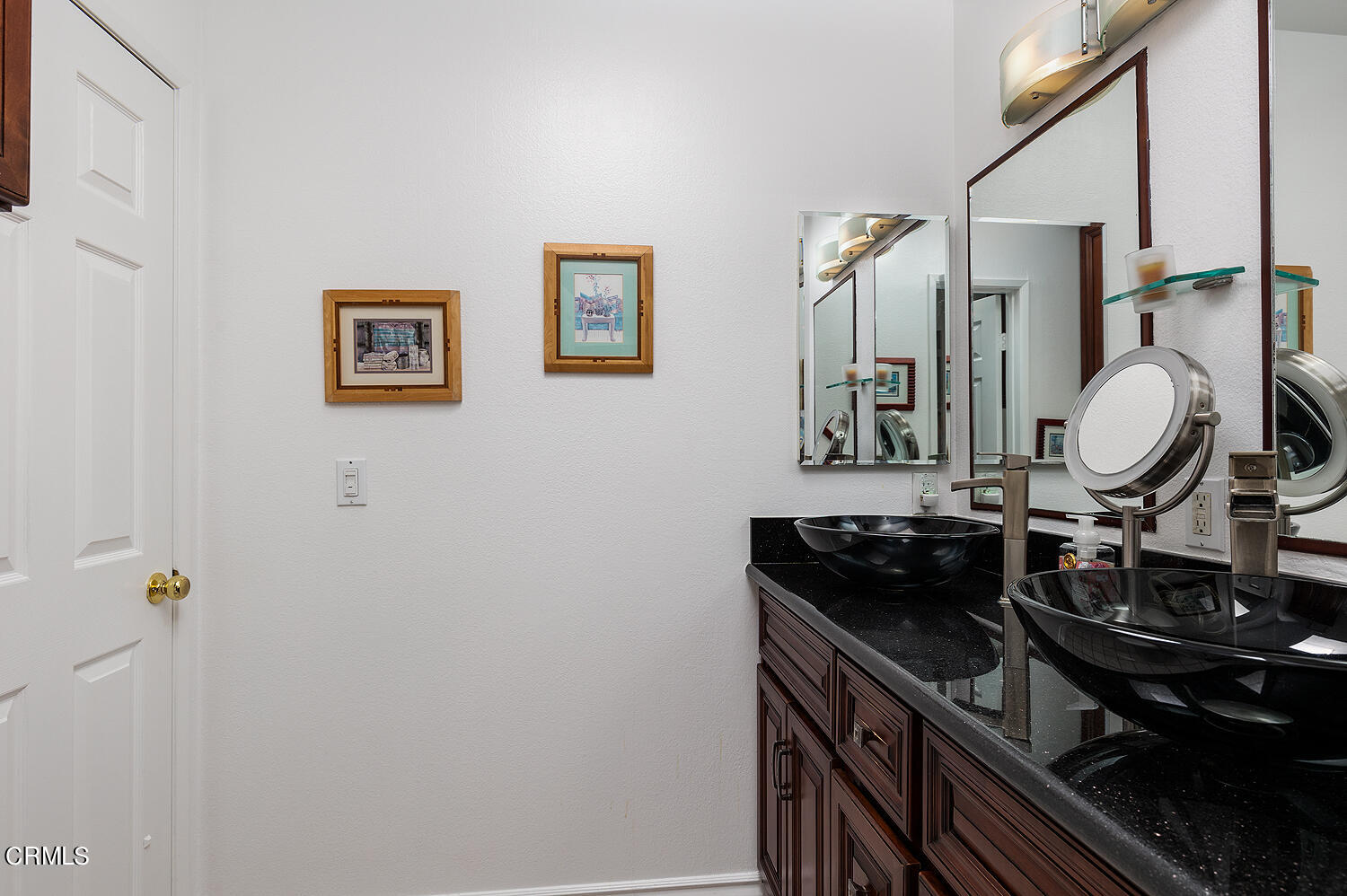 3075 Foothill Boulevard, Unit 137 La Crescenta, CA 91214 - Photo 18 of 23 a bathroom with a sink and a mirror