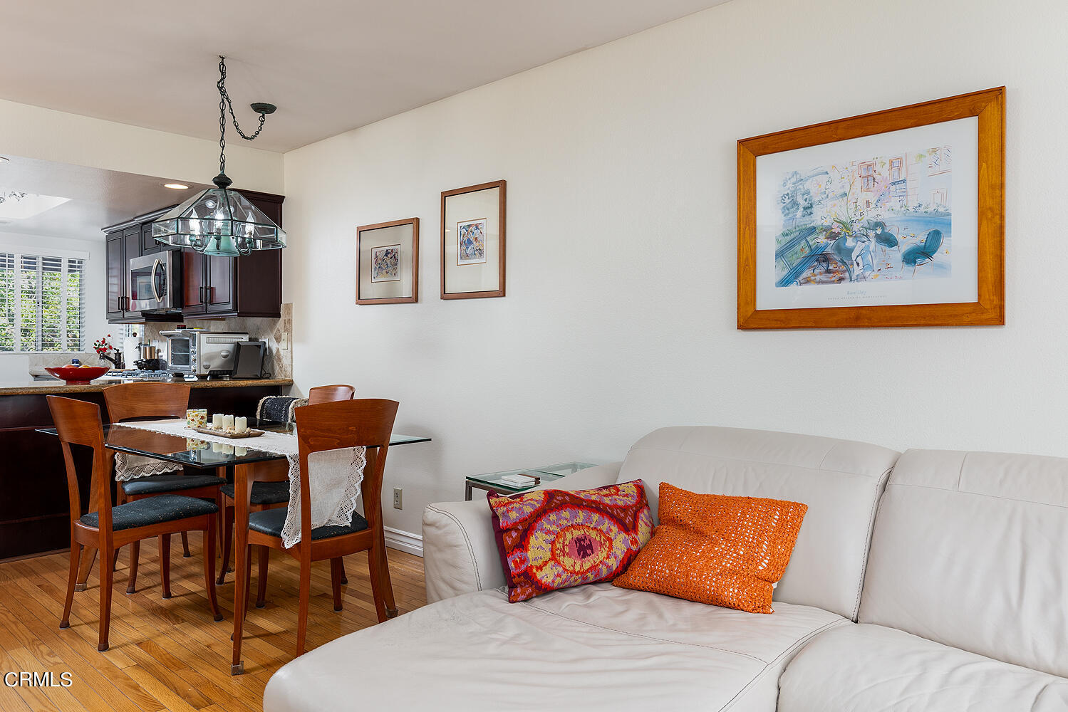 3075 Foothill Boulevard, Unit 137 La Crescenta, CA 91214 - Photo 9 of 23 a living room with furniture a chandelier and a flat screen tv