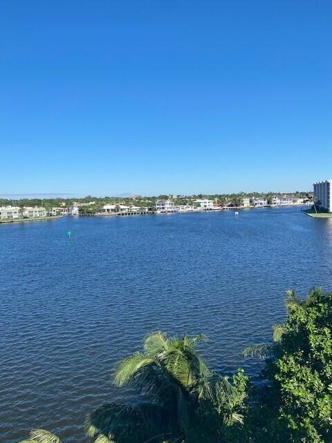 900 Lago Mar Lane, Unit PH Boca Raton, FL 33431 - Photo 49 of 58 a view of a lake with a city view