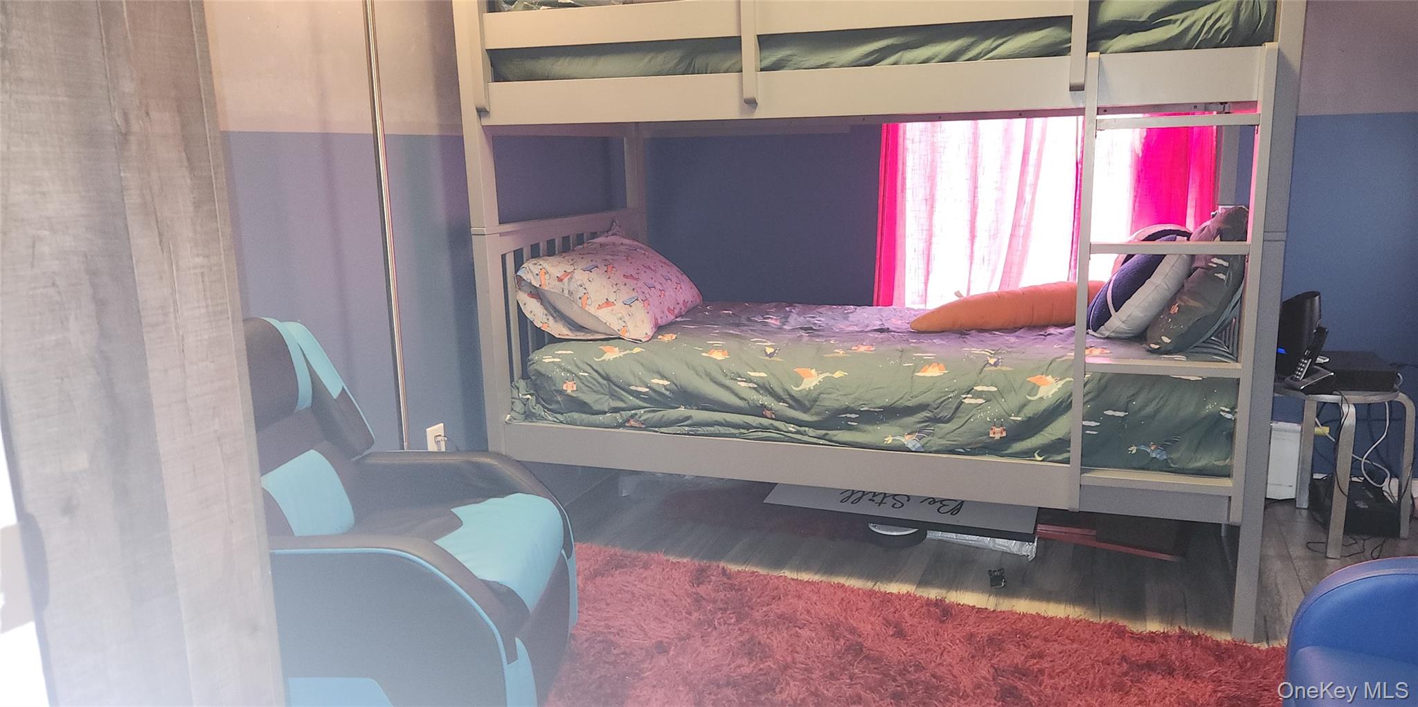 5 Magar Road Middletown, NY 10940 - Photo 21 of 31 a room with furniture and a flat screen tv