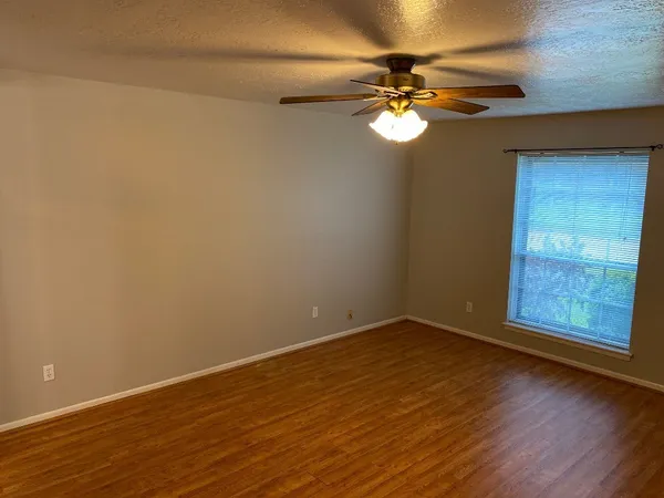 a bathroom with a bath tub and a shower