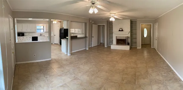 a view of house with backyard