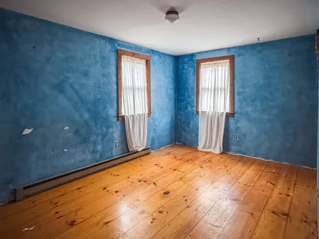 a view of a room with a window