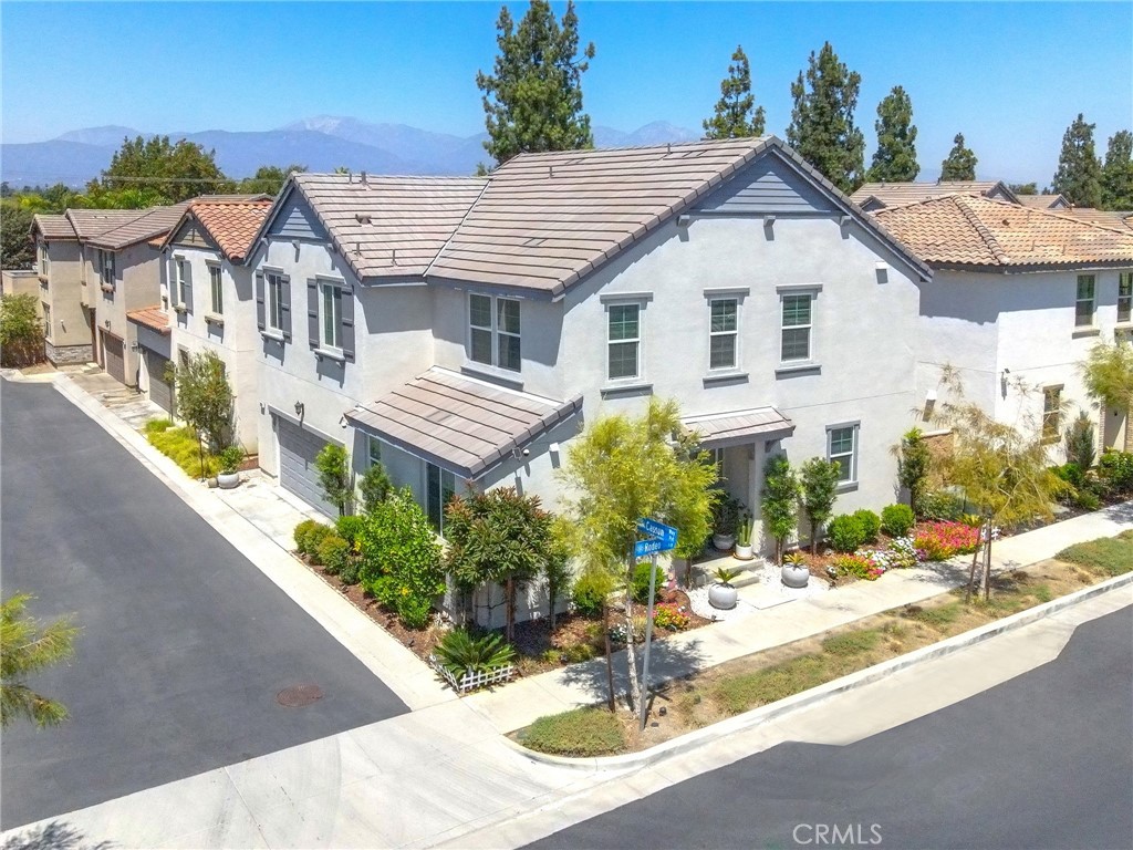 981 Rodeo Road Pomona, CA 91766 - Photo 2 of 47 a aerial view of a house with table and chairs