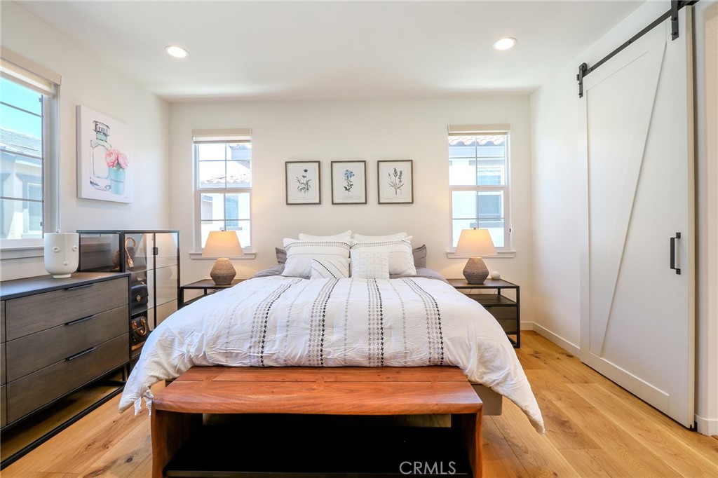 981 Rodeo Road Pomona, CA 91766 - Photo 26 of 47 a bedroom with a bed and a window