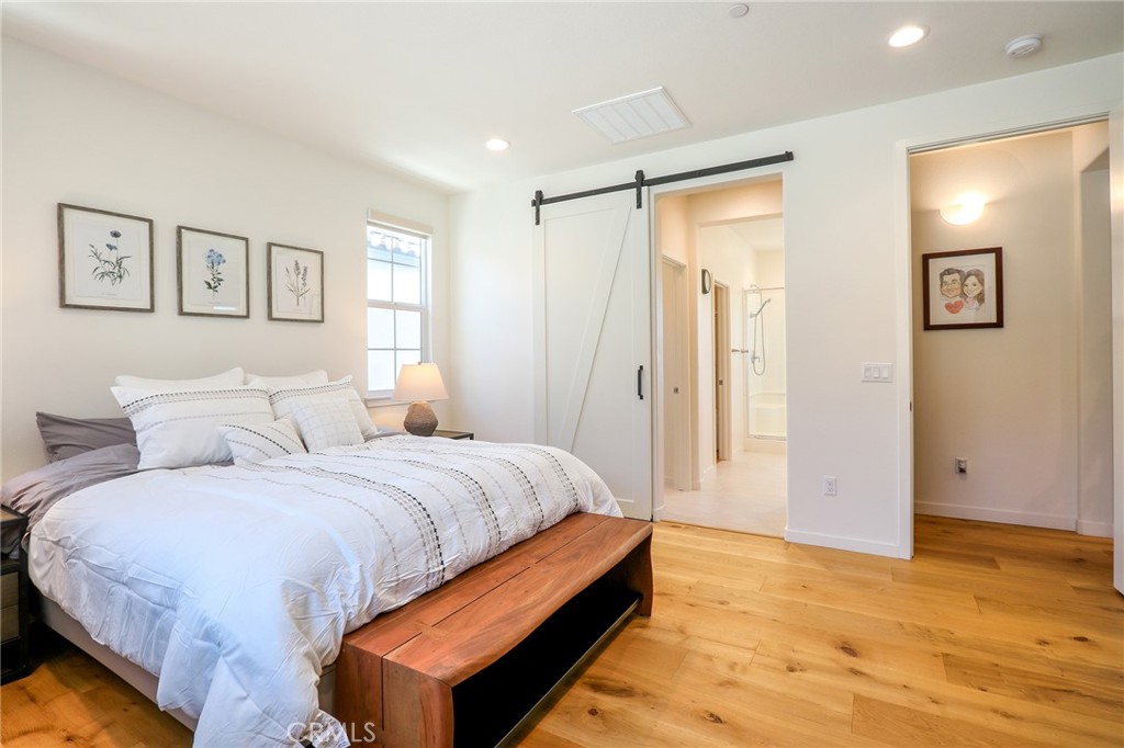 981 Rodeo Road Pomona, CA 91766 - Photo 27 of 47 a bedroom with a bed and a view of bathroom