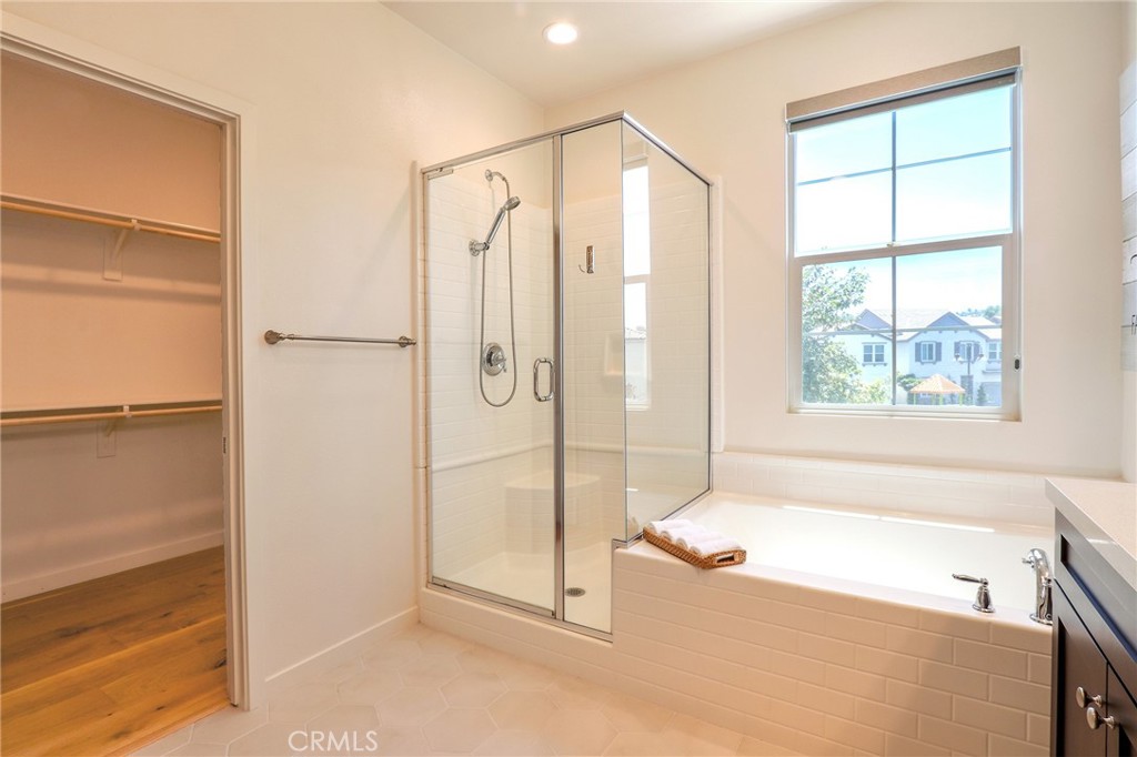 981 Rodeo Road Pomona, CA 91766 - Photo 30 of 47 a bathroom with a bathtub and a shower