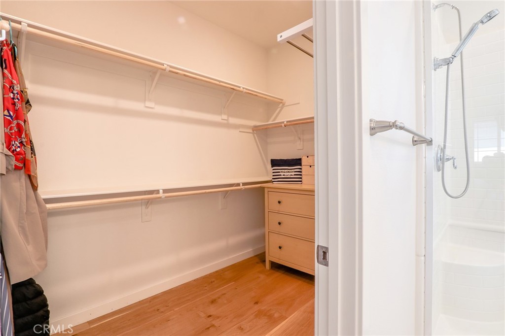 981 Rodeo Road Pomona, CA 91766 - Photo 31 of 47 a view of walk in closet with empty racks