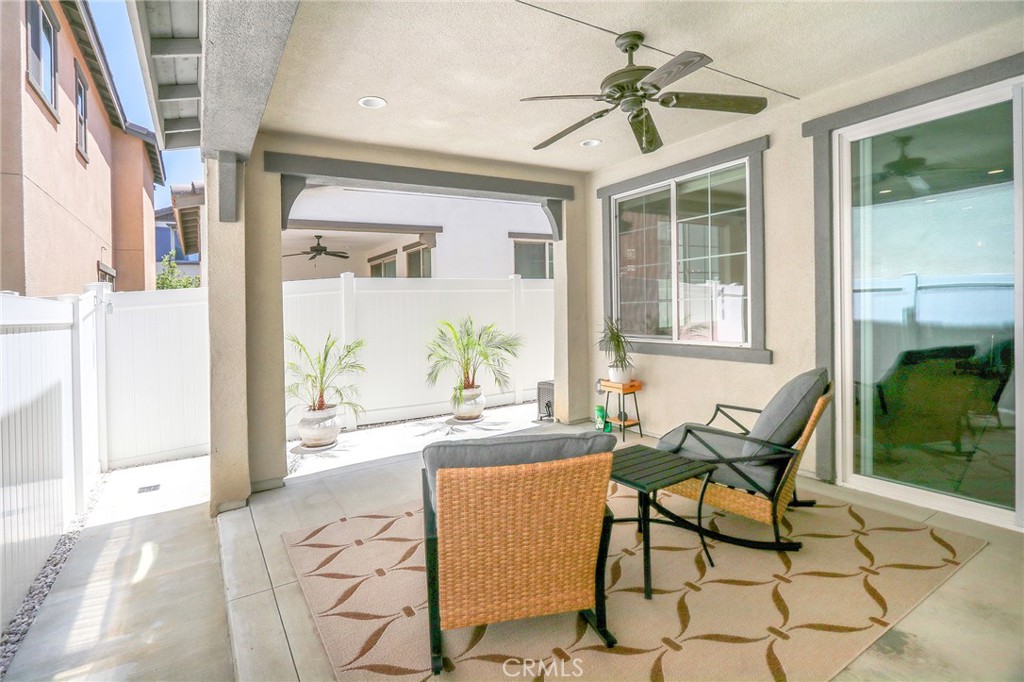 981 Rodeo Road Pomona, CA 91766 - Photo 38 of 47 a living room with furniture and a window